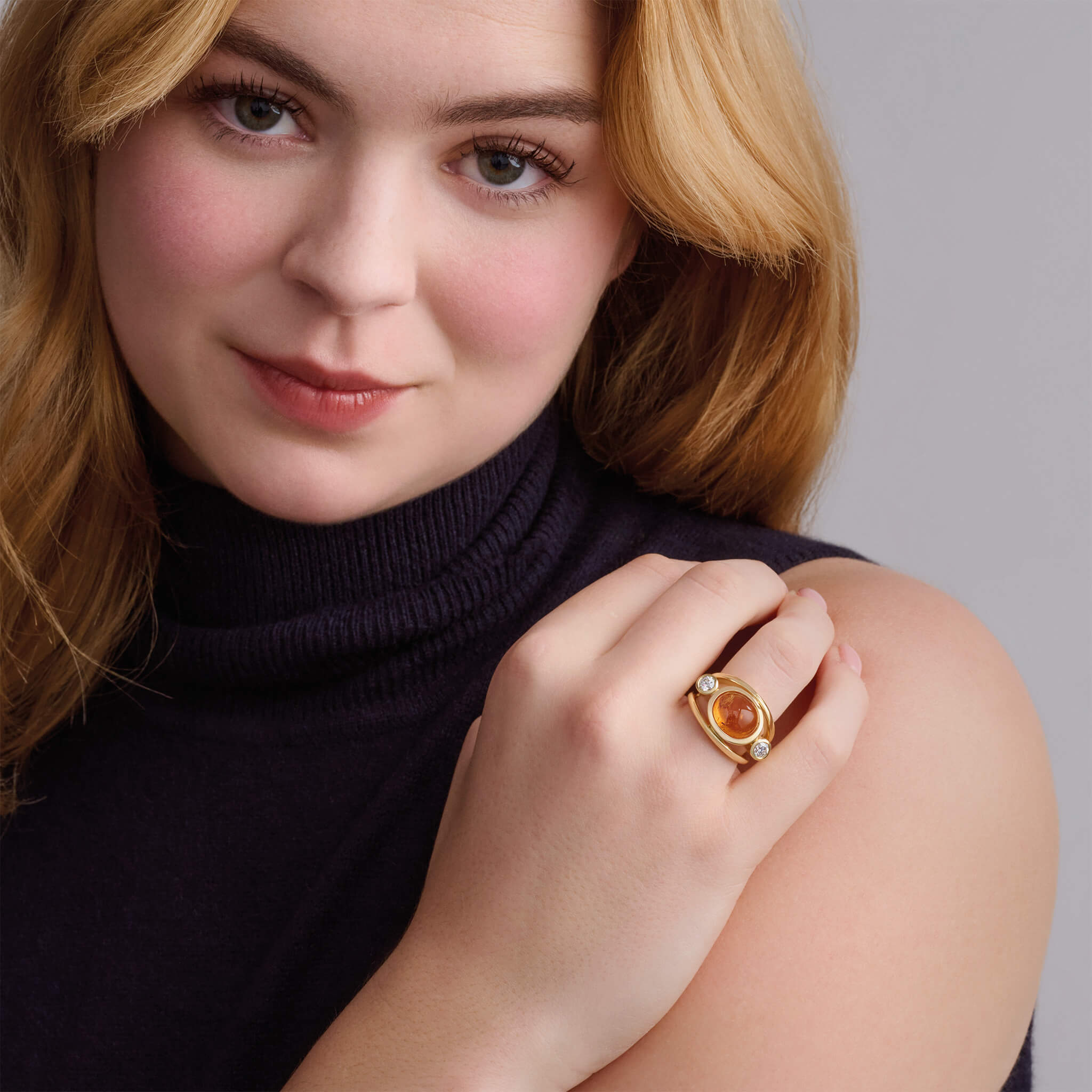 Aeneus ring mandarin garnet cabochon.