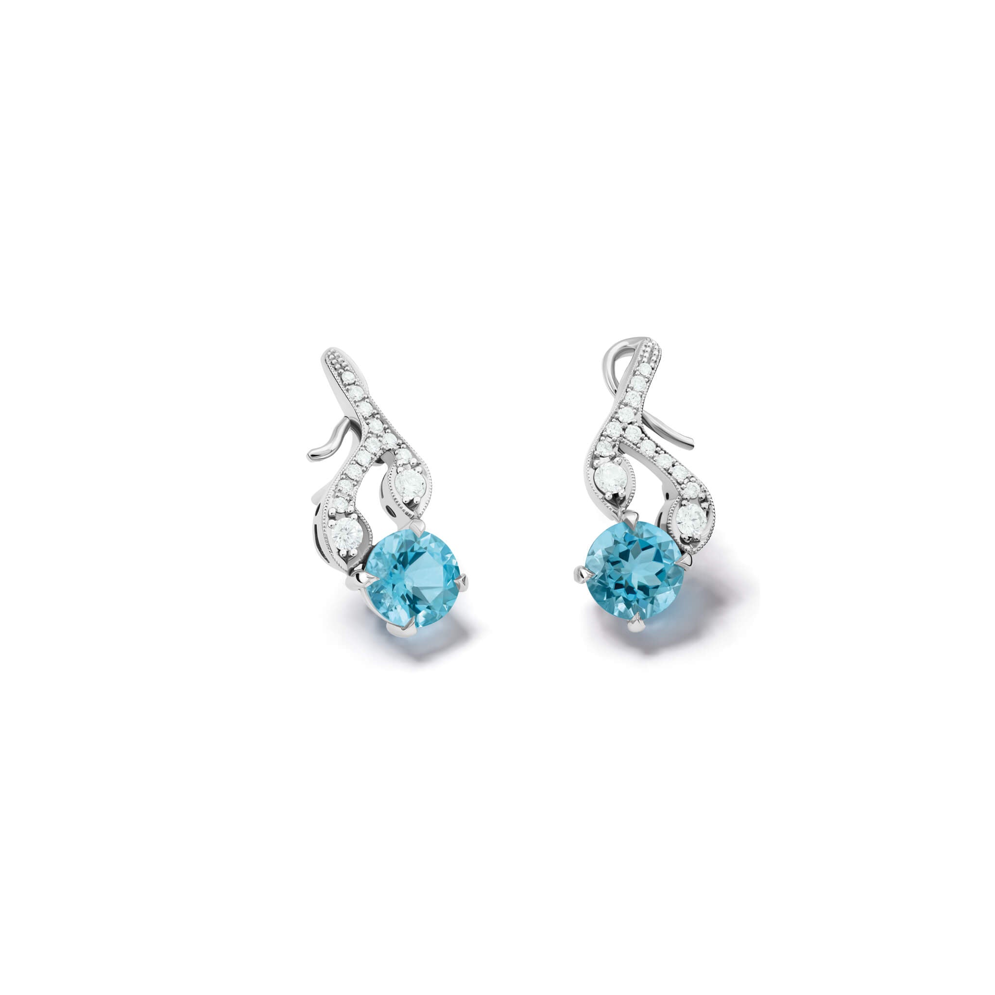 Handcrafted 18ct white gold earrings with diamonds and a aquamarine drop in the shape of a sprig of rosemary.