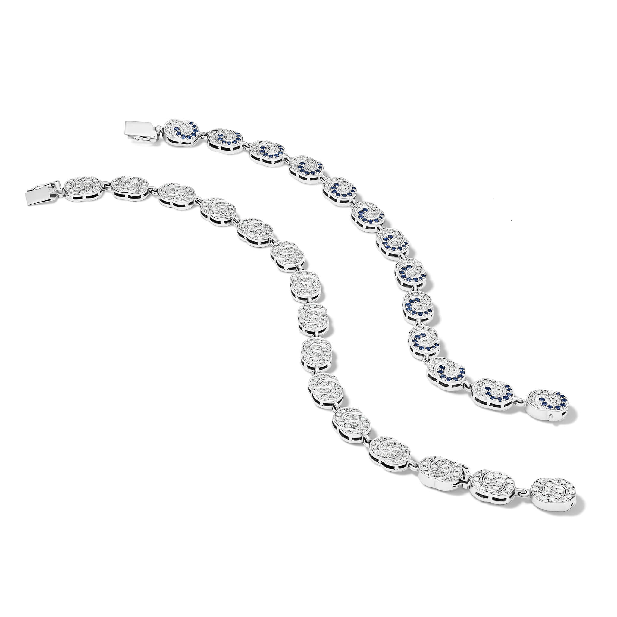 Handcrafted 18ct white gold Sabina necklace set with diamonds on one side and diamonds and blue sapphire on the other can be worn as a necklace or transformed into two bracelets.