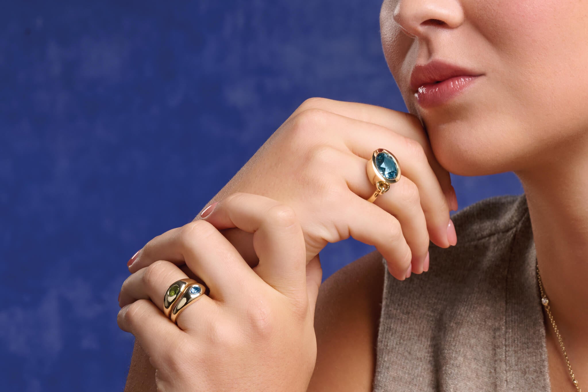 Model wearing Duplus and Baguette ring with sapphire.