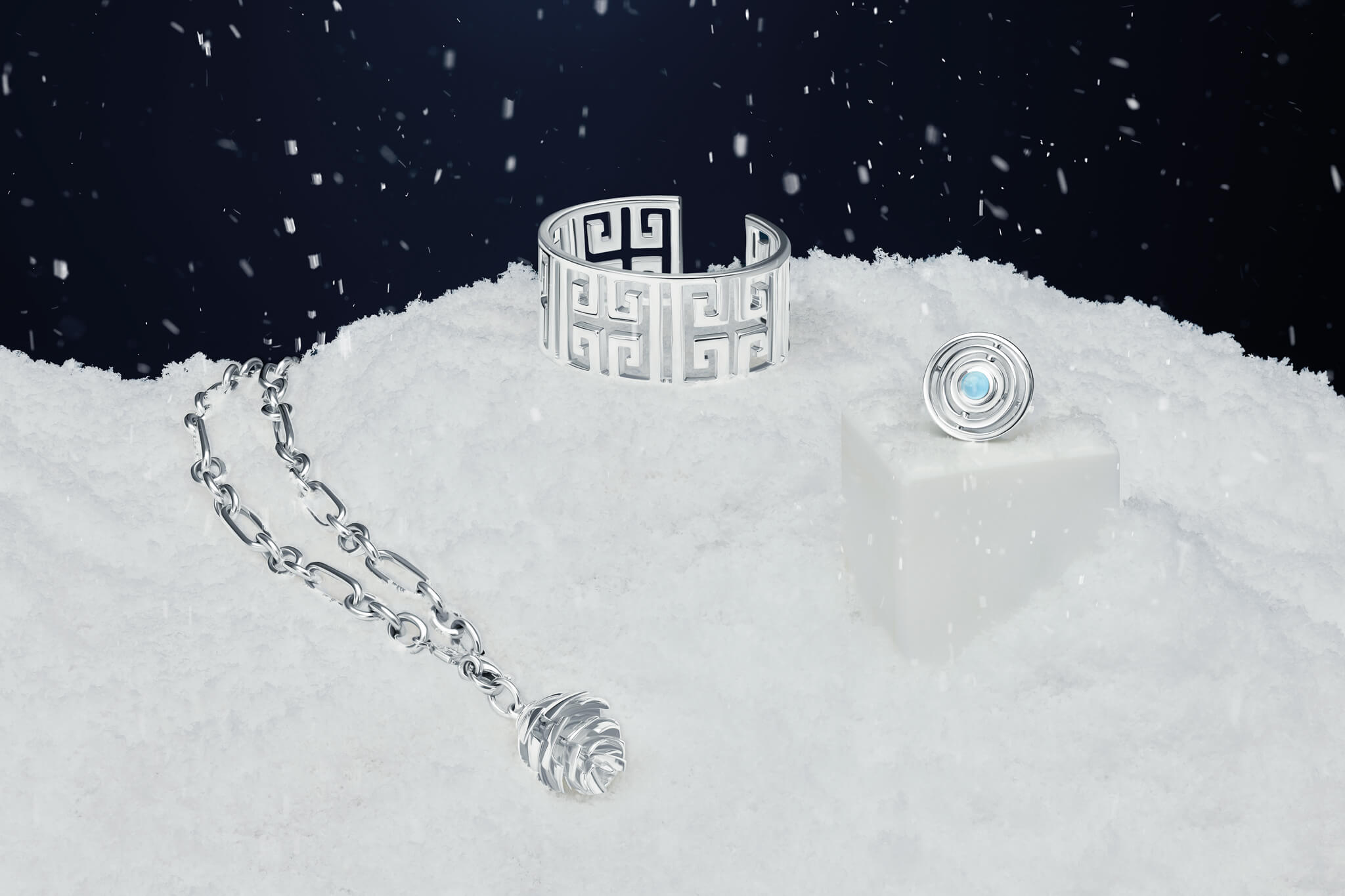 Handcrafted silver jewellery for Christmas gifts, including modern statement silver rings, pendants and cuff bracelets.