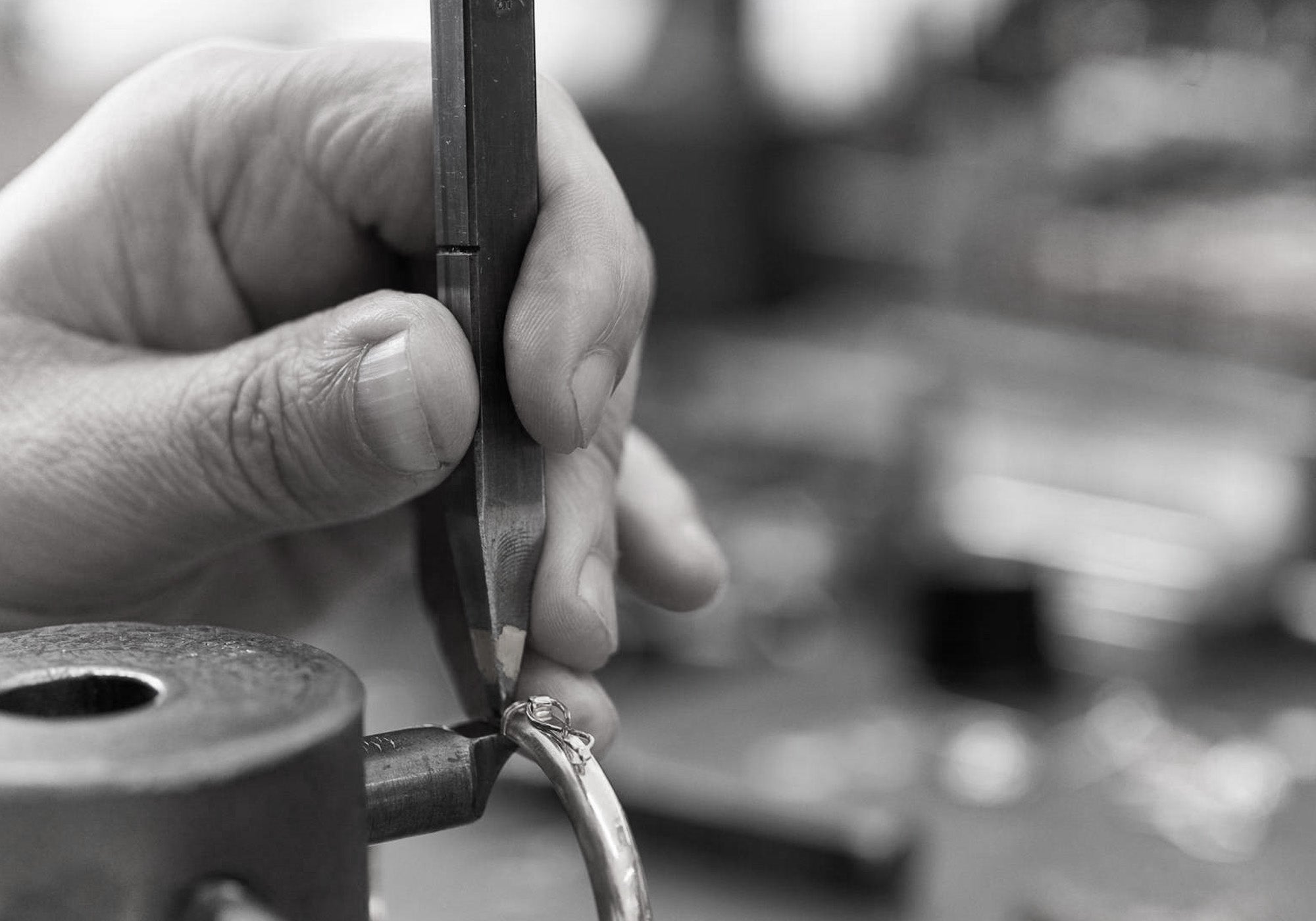 Craftsman working on a ring.