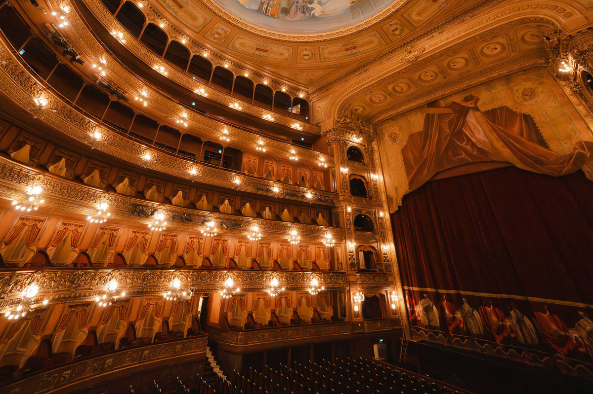 Theatre seating area and stage curtains