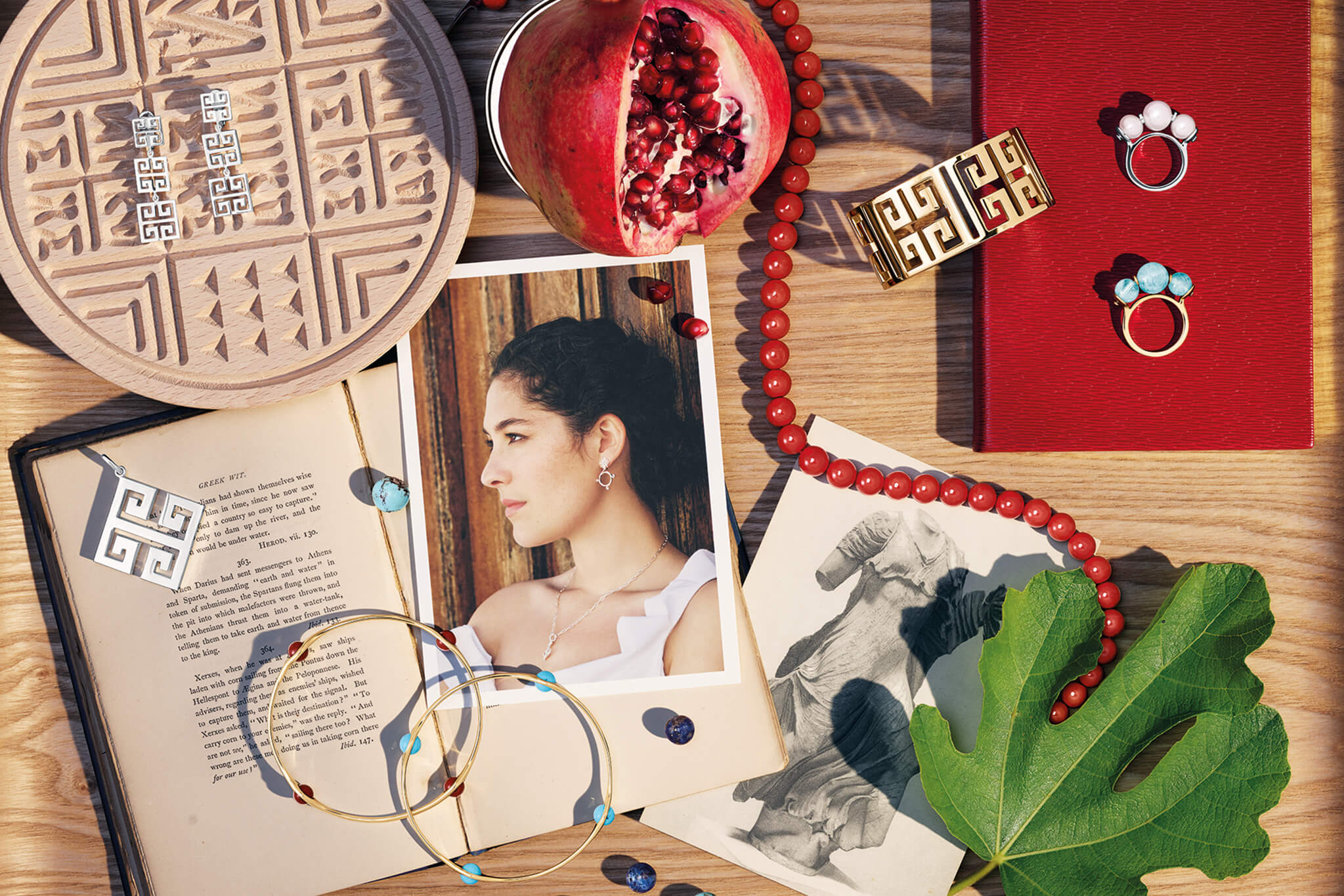 Tray of Greco jewels.