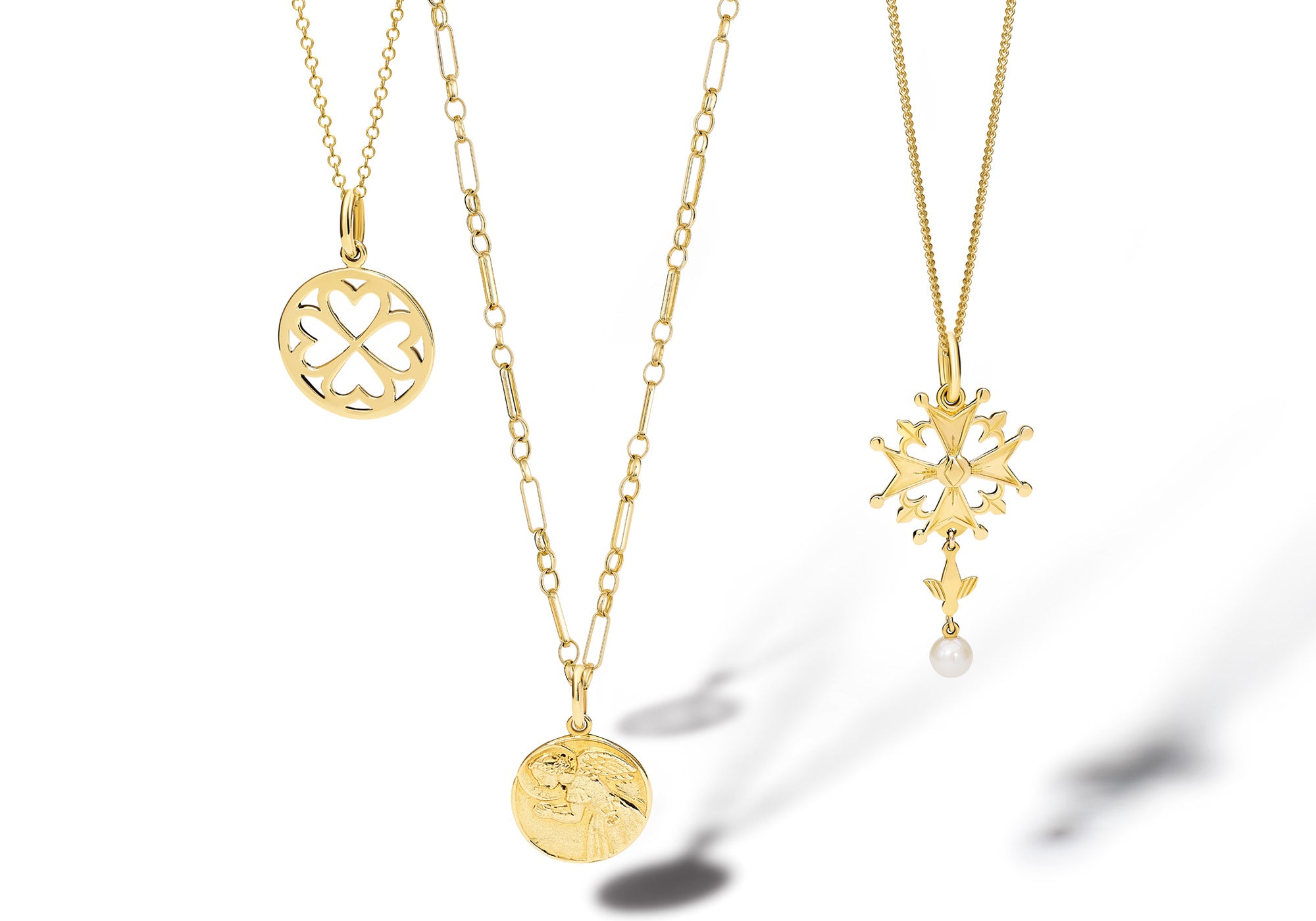 Varying yellow gold chain necklaces with different necklace pendants.