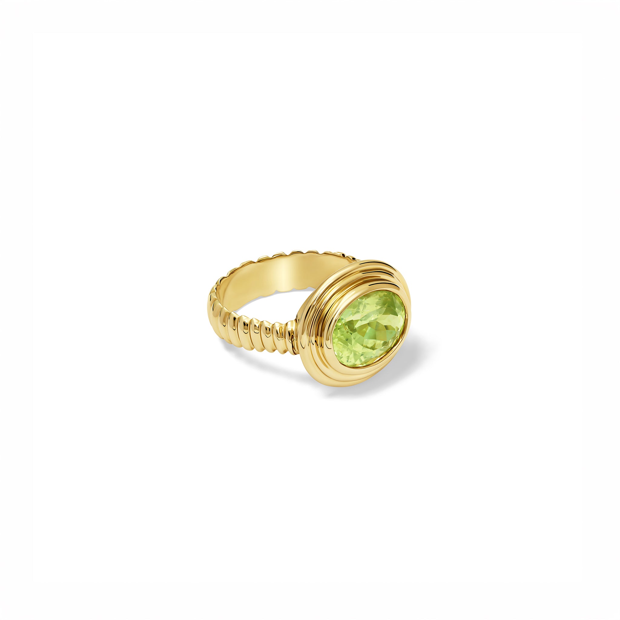 Handcrafted yellow gold ring featuring a prominent facetted cut lime yellow chrysoberyl