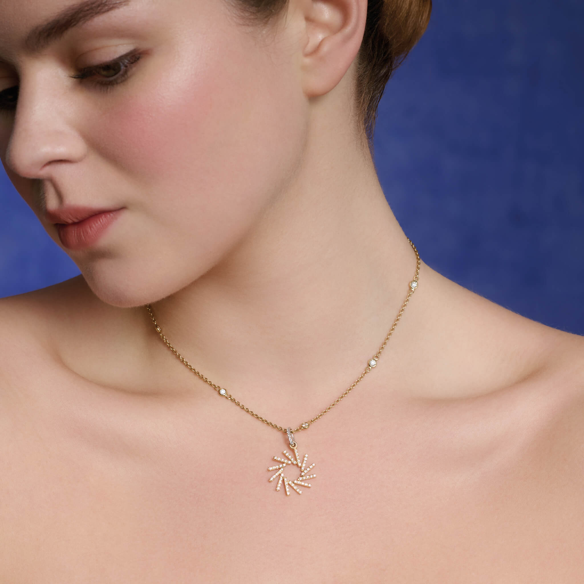 Model wears Cassandra Goad Large Zellije pendant with diamonds.