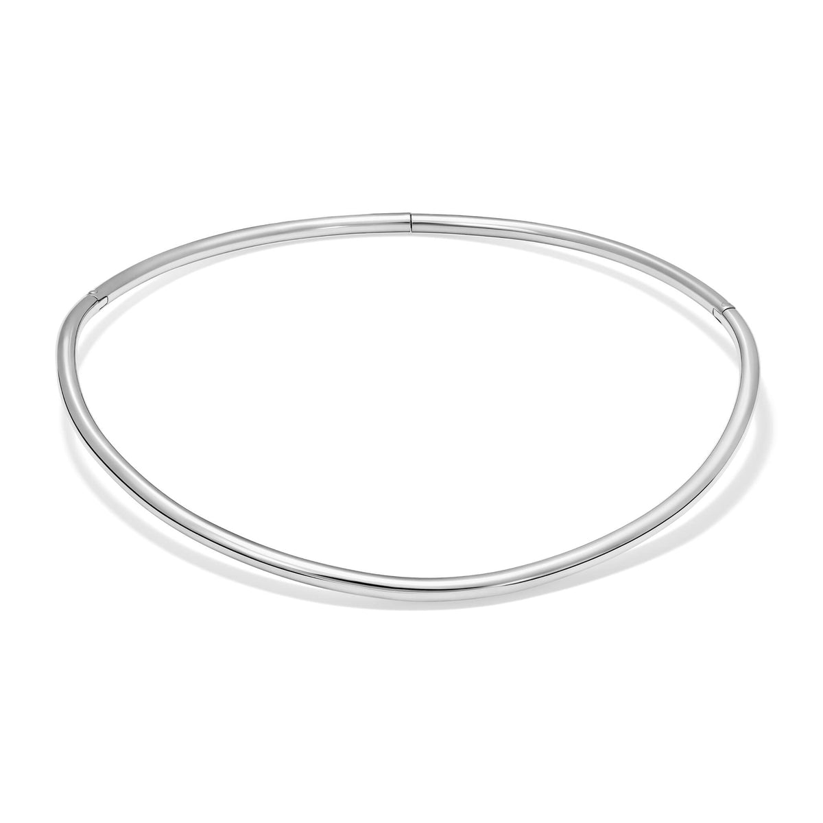 Zola torque necklace in solid sterling silver. This torque necklace sits just on the collarbone and is perfect to wear alone or with a statement pendant.