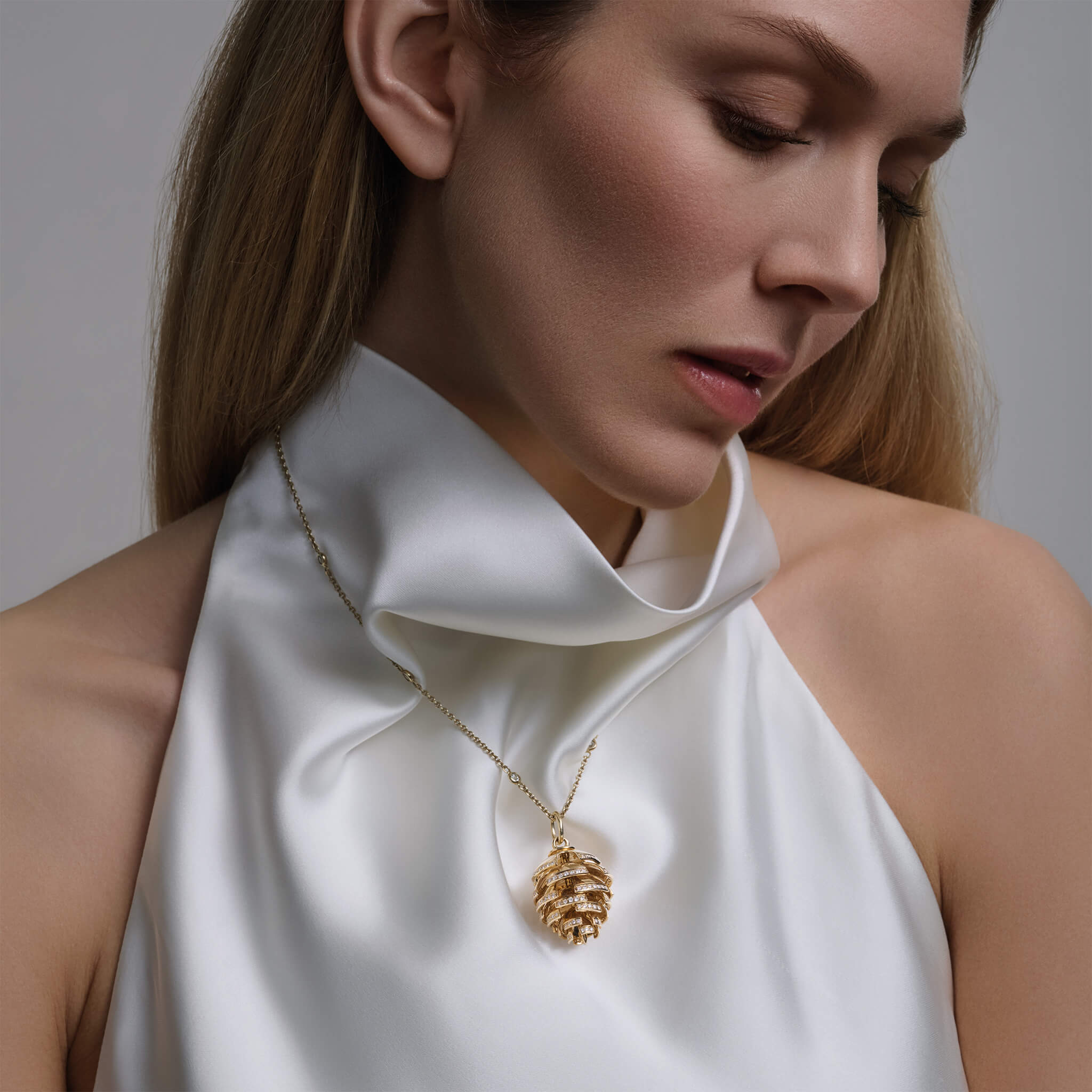 Model wears Furu Kongle pendant from Cassandra Goad's Scandinavia collection