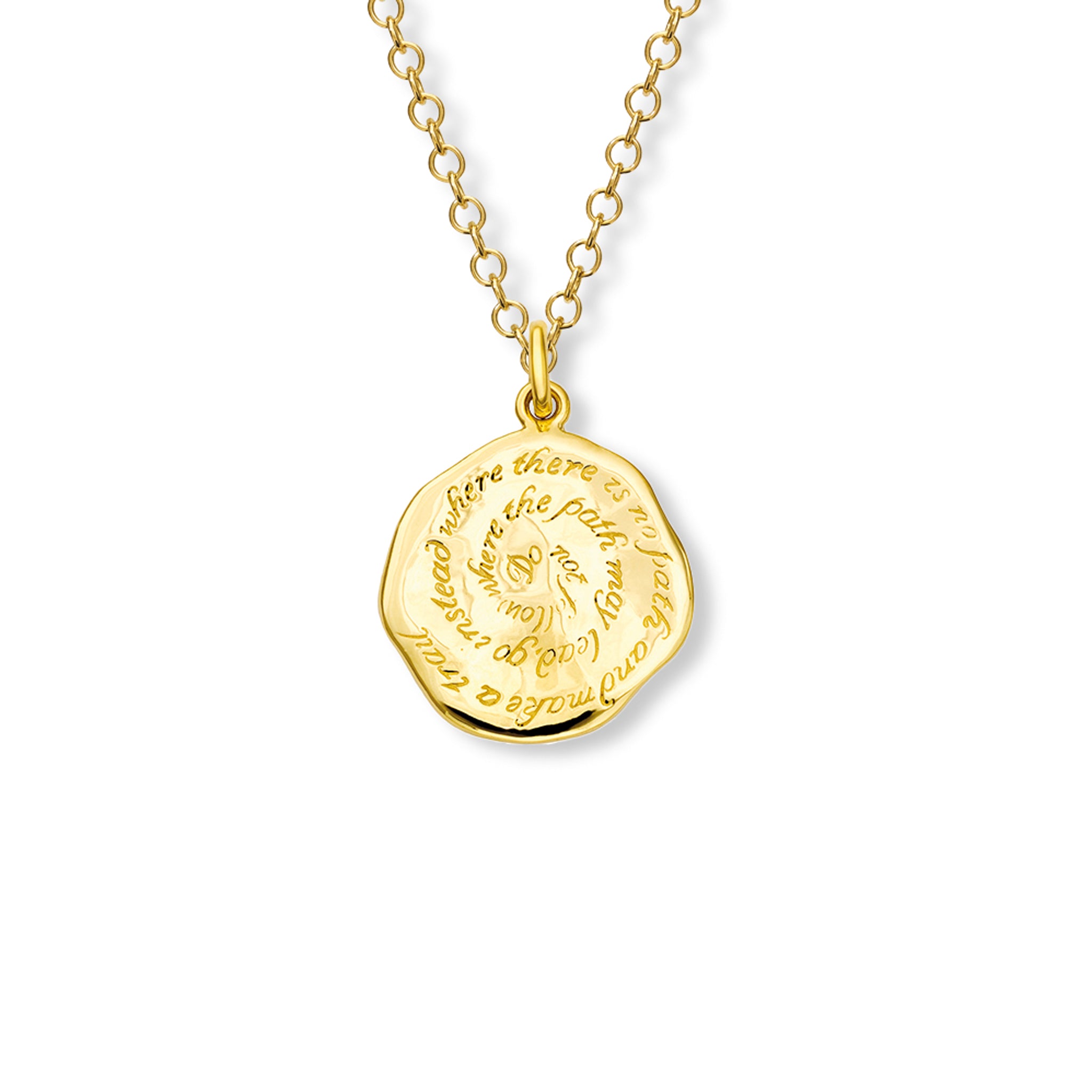 Handcrafted round yellow gold necklace pendant engraved with the quote, 'Do not follow where the path may lead, go instead where there is no path and make a trail.'
