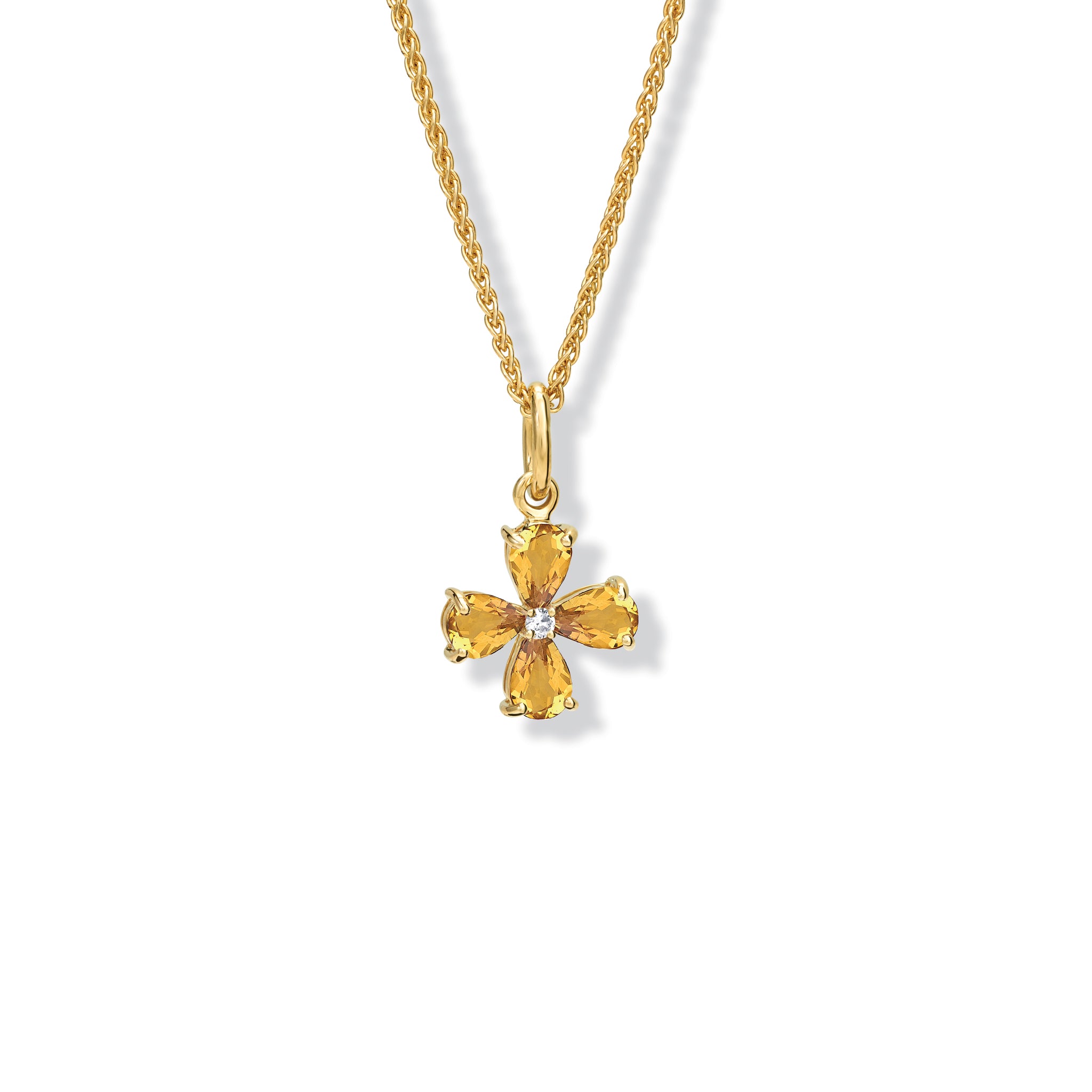 Handcrafted yellow gold four-leaf clover necklace pendant with citrine and diamond, birthstone of November.