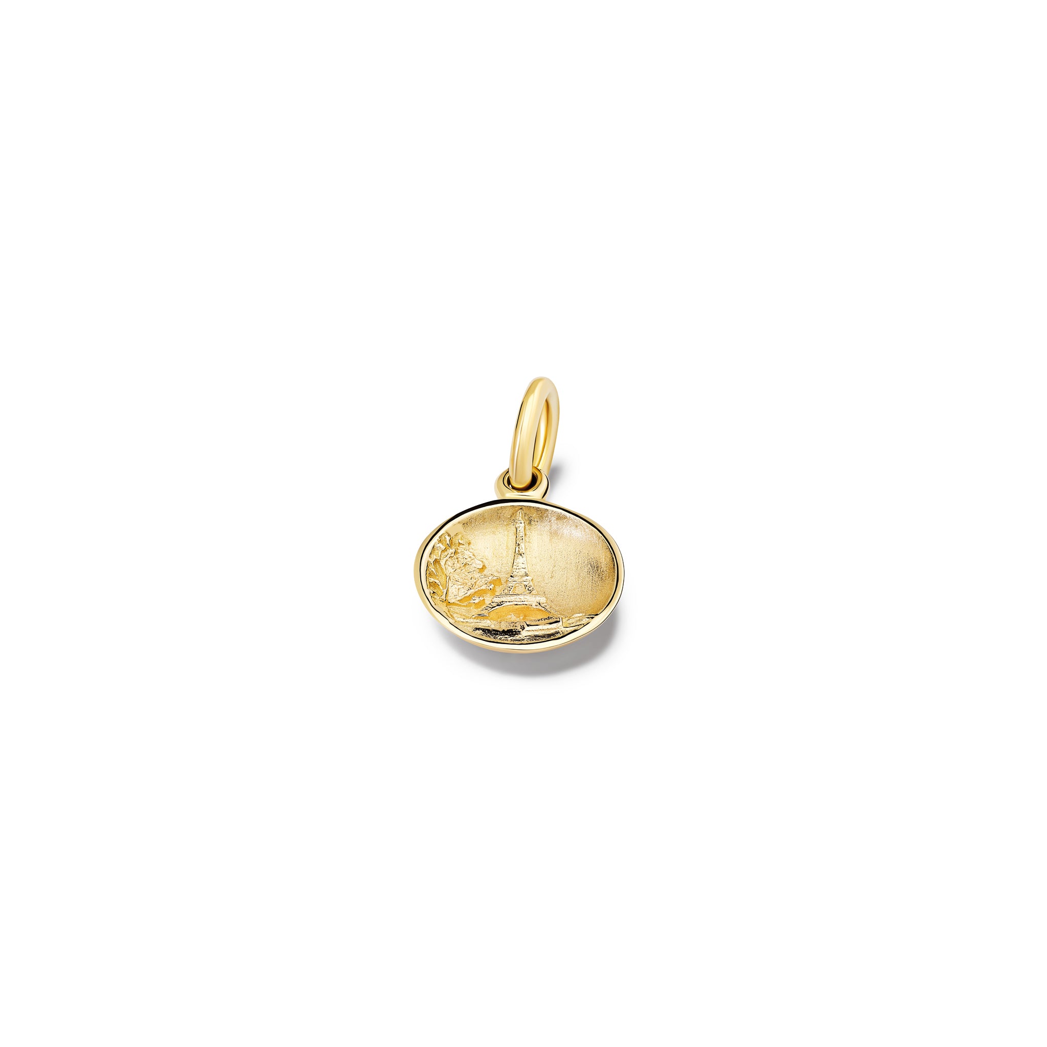 Handcrafted yellow gold necklace pendant 'en relief' with the eiffel tower in Paris, France.

