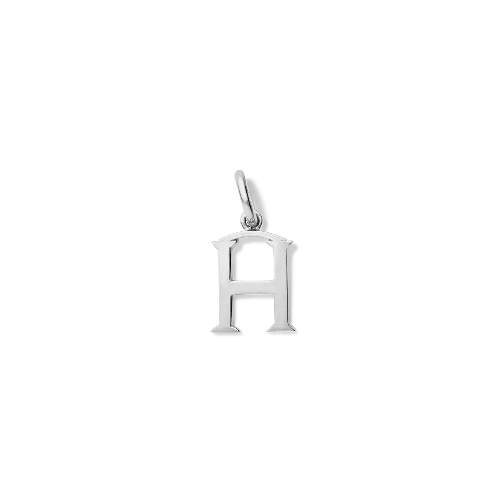 Handcrafted sterling silver initial H necklace pendant, with a loop at the top for chain attachment.