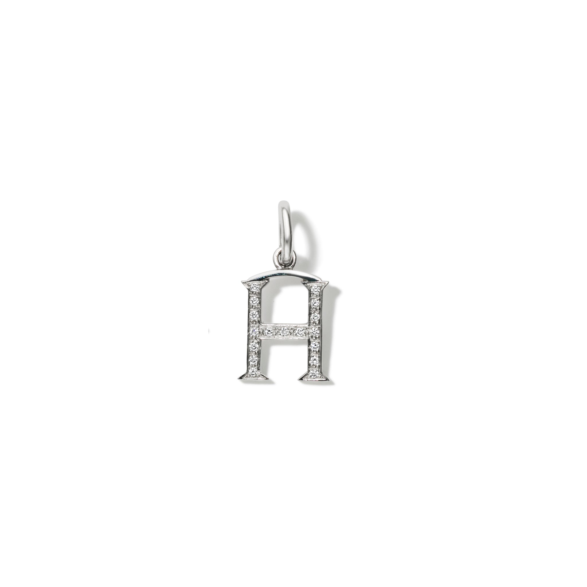 Handcrafted 18ct white gold initial H necklace pendant set with diamond pav?, with a loop at the top for chain attachment.