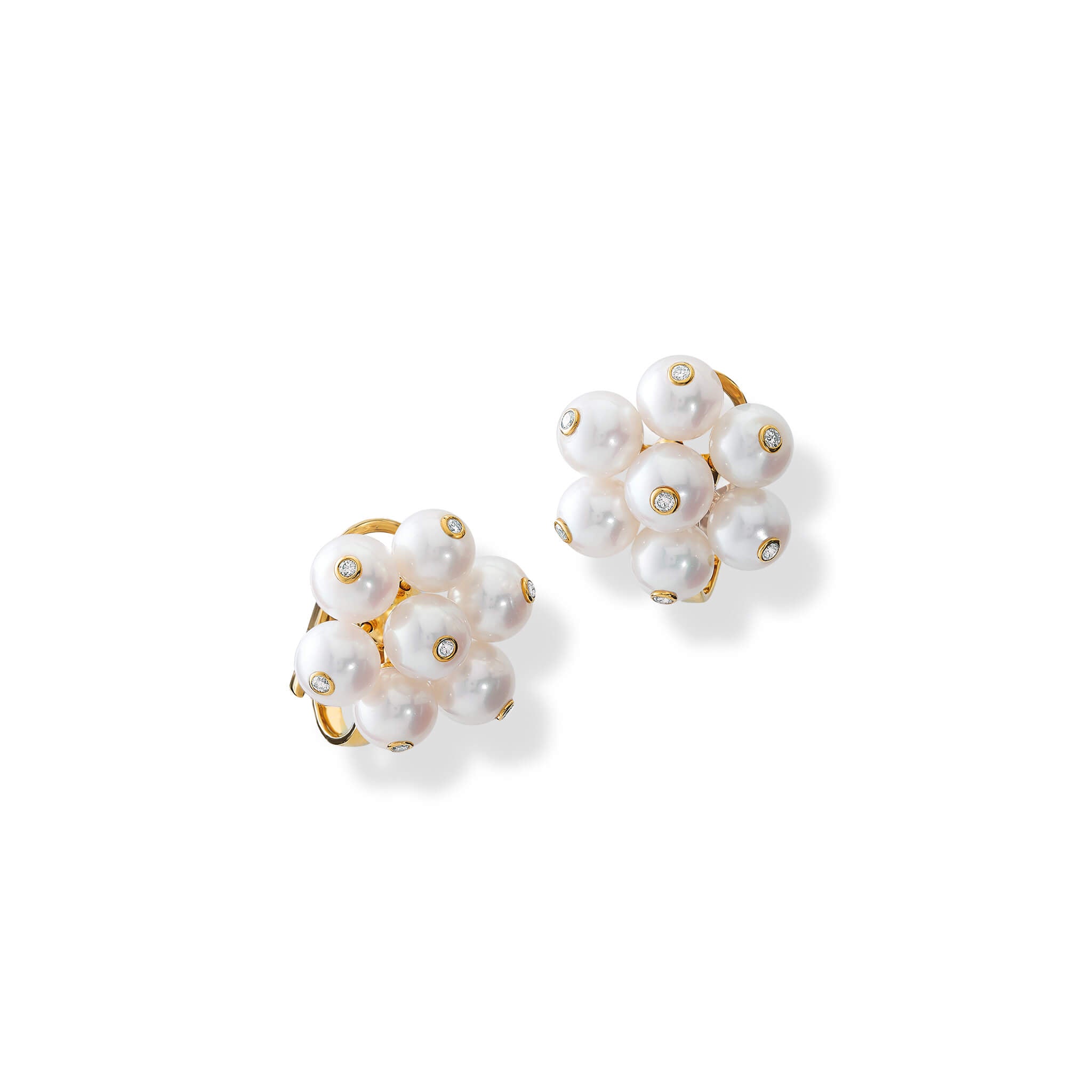 Handcrafted 18ct yellow gold earrings featuring a cluster of white pearls, the birthstone of June. The pearls are interspersed with small diamonds.