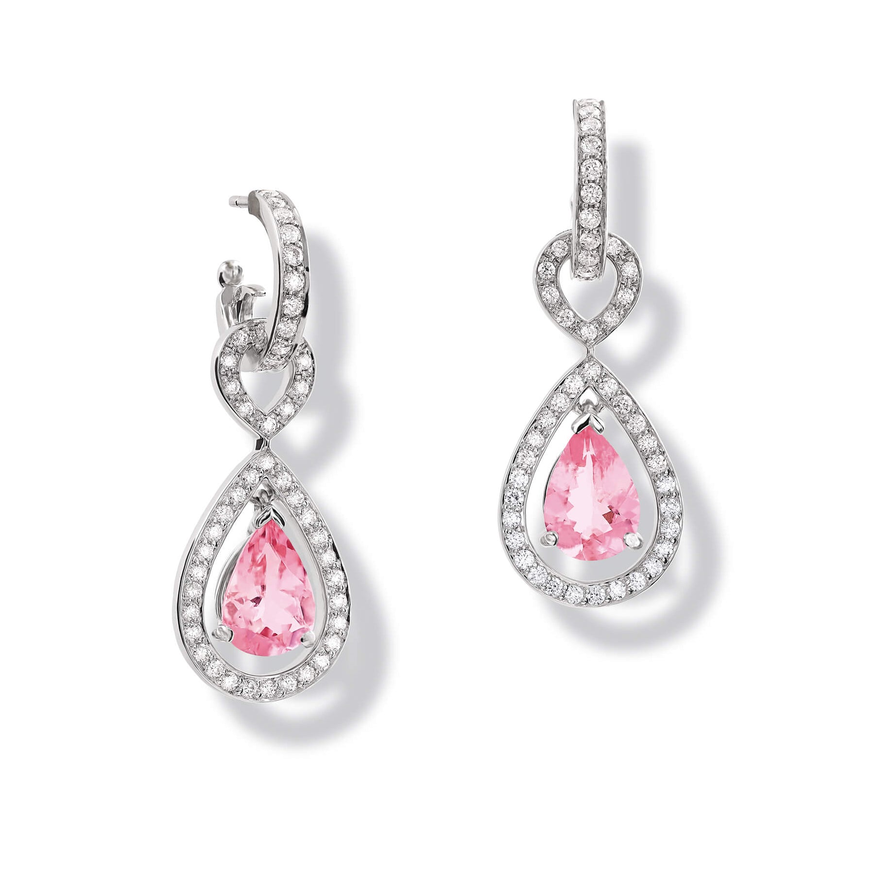 Handcrafted 18ct white gold earring drops featuring a central pink sapphire surrounded by diamonds.
