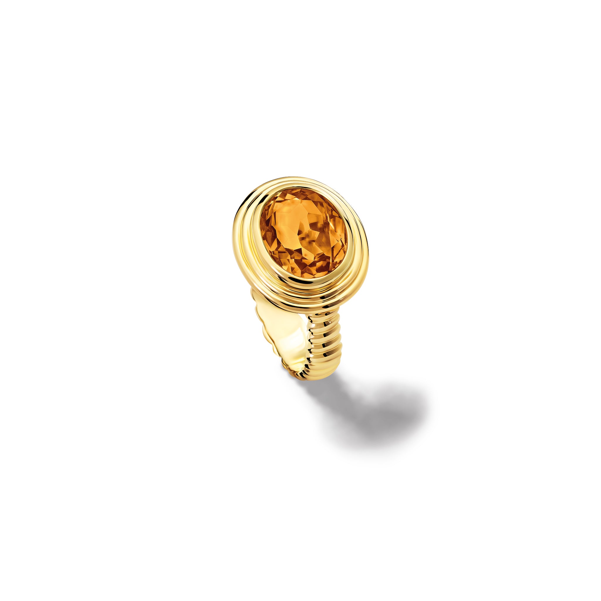 Handcrafted yellow gold ring featuring a prominent oval citrine, birthstone of November.