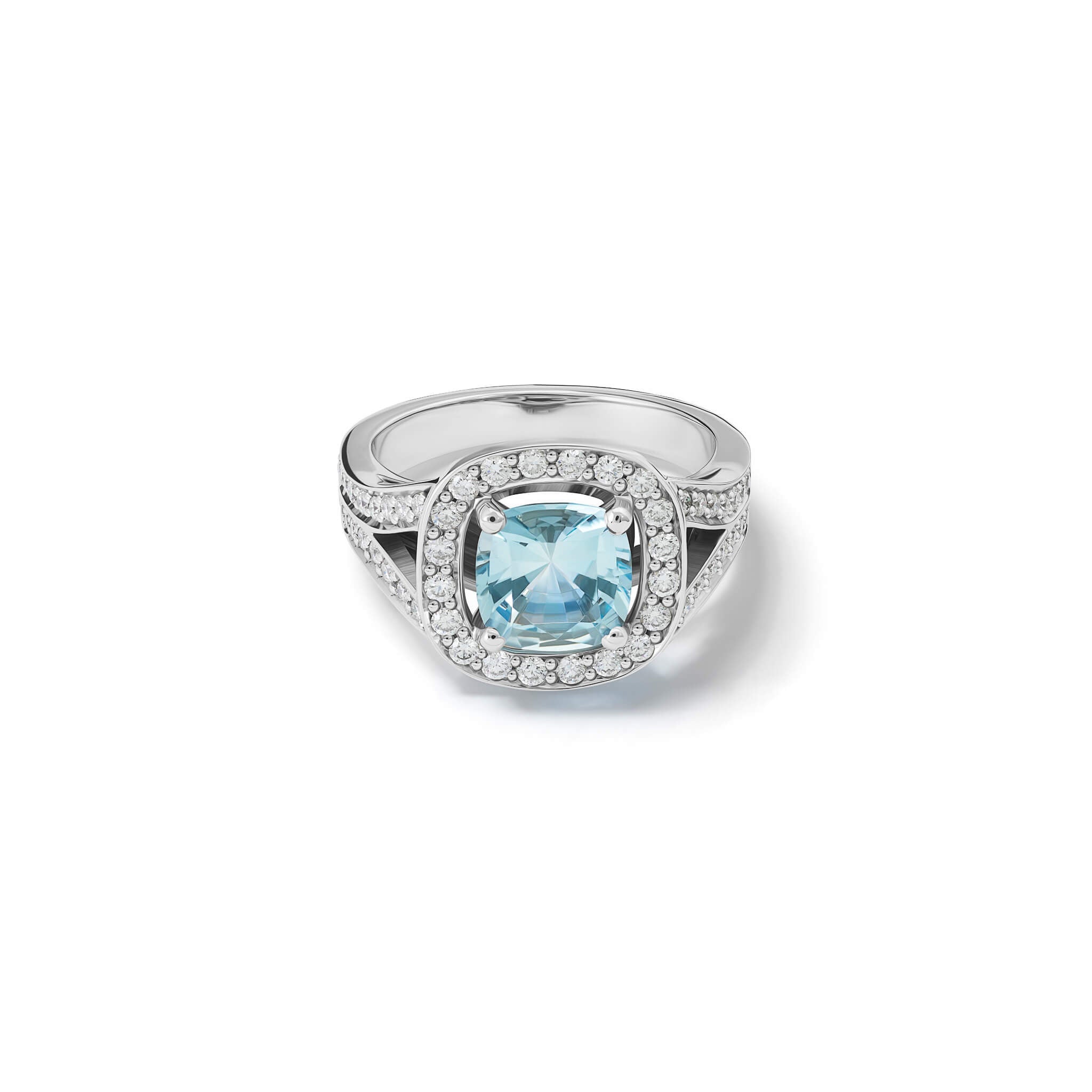 Handcrafted 18ct white gold engagement ring featuring a claw set cushion-cut aquamarine surrounded by a halo of small diamonds and smaller diamonds embedded along the band.