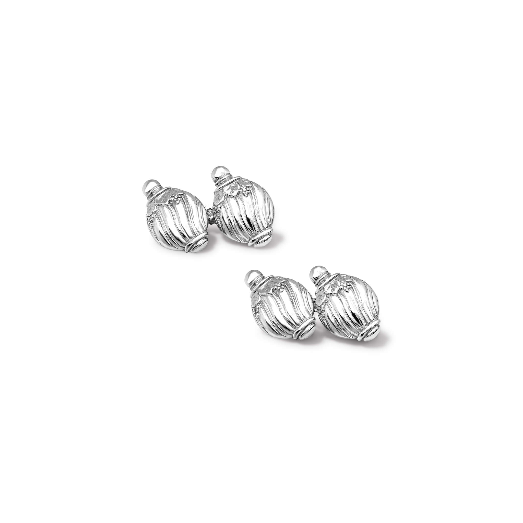 Handcrafted silver double ended cufflinks featuring a shell shape. 