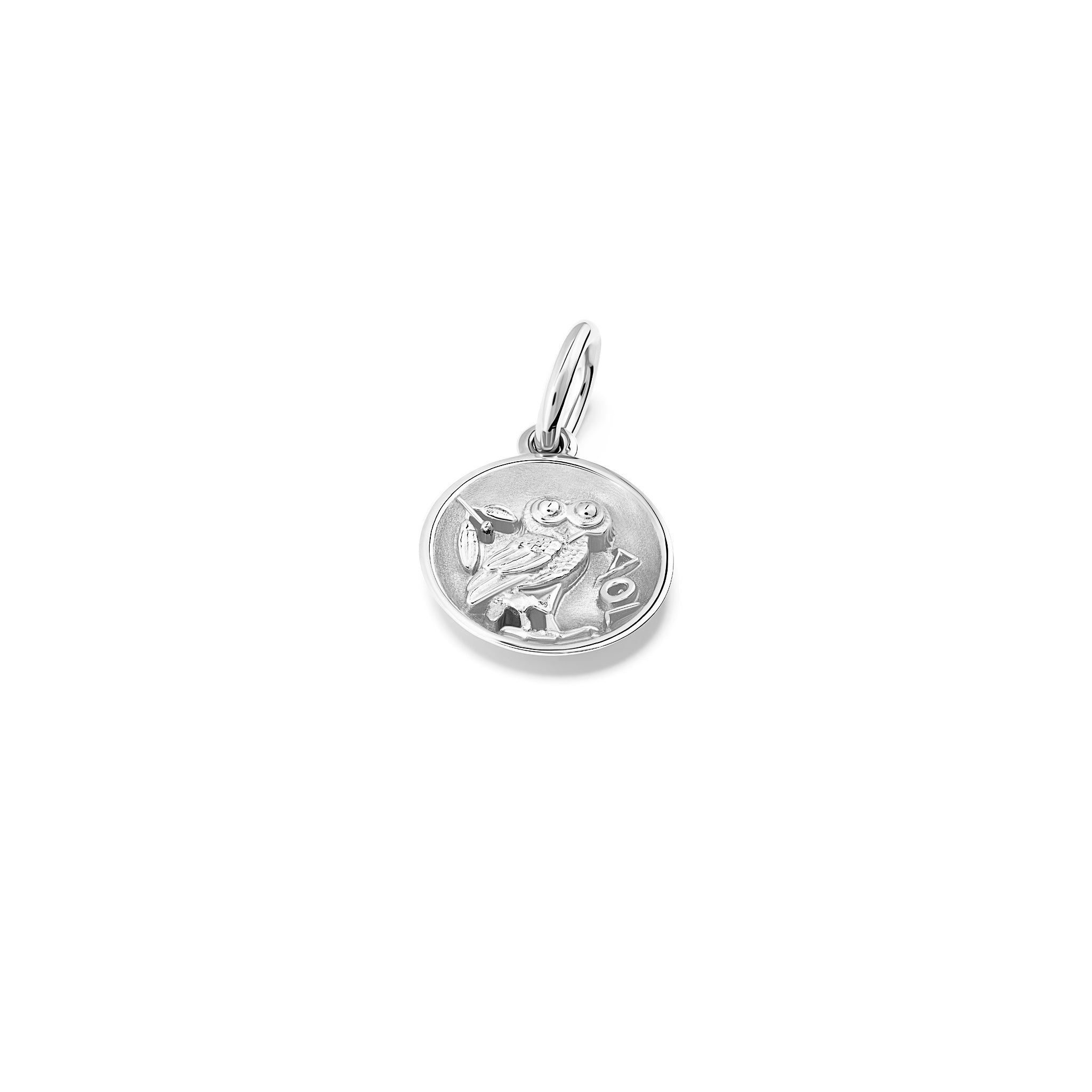 Handcrafted silver necklace pendant with an owl 'en relief'.