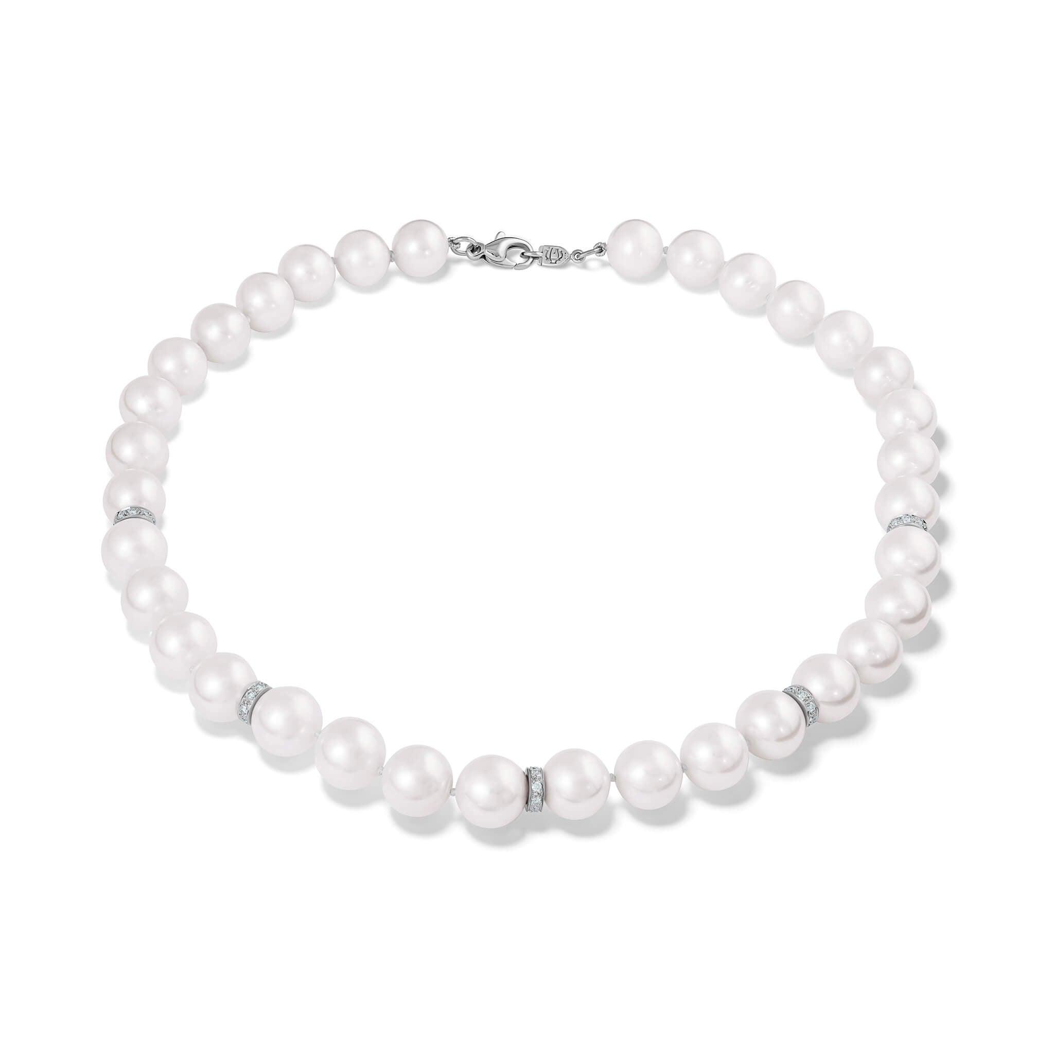 Handcrafted freshwater pearl necklace with 18ct white gold and diamond spacers.