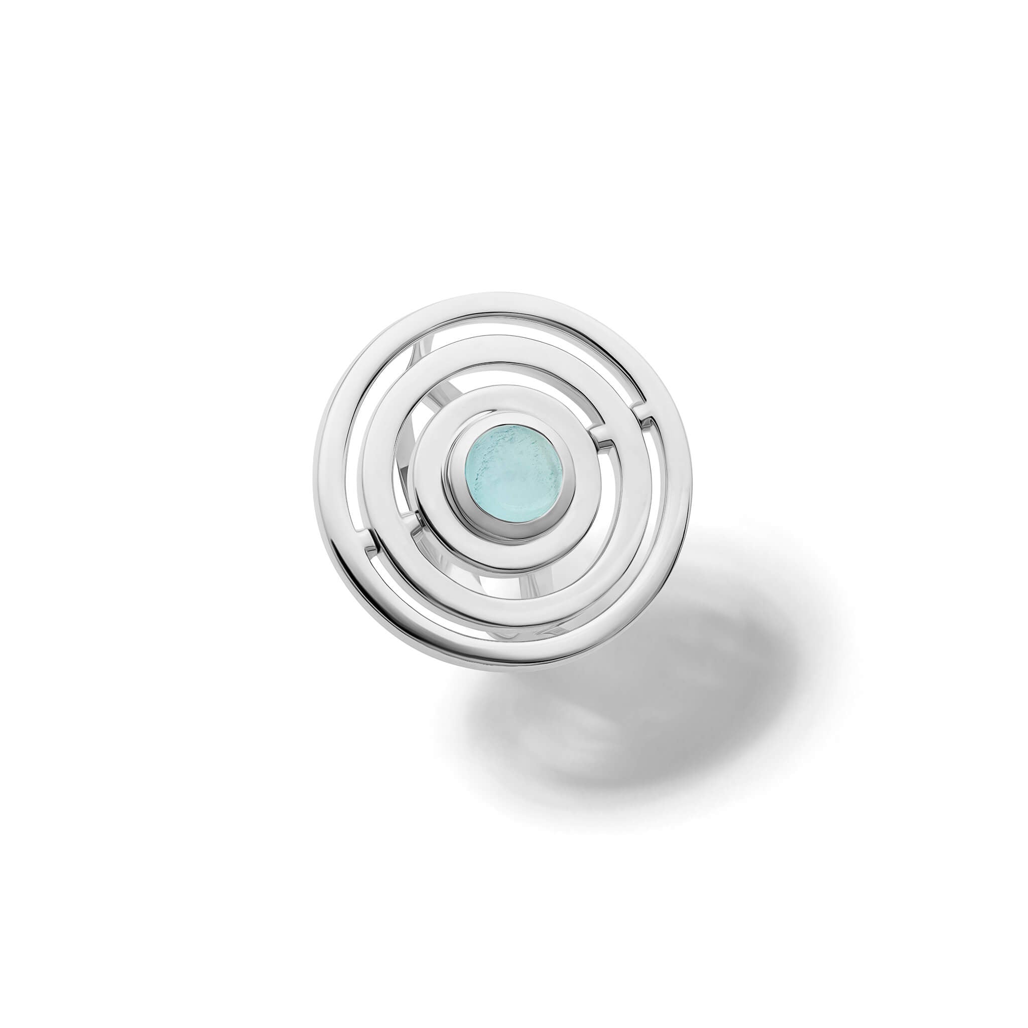 Handcrafted sterling silver cocktail ring featuring three concentric circles with movement and a central cabochon blue aquamarine.