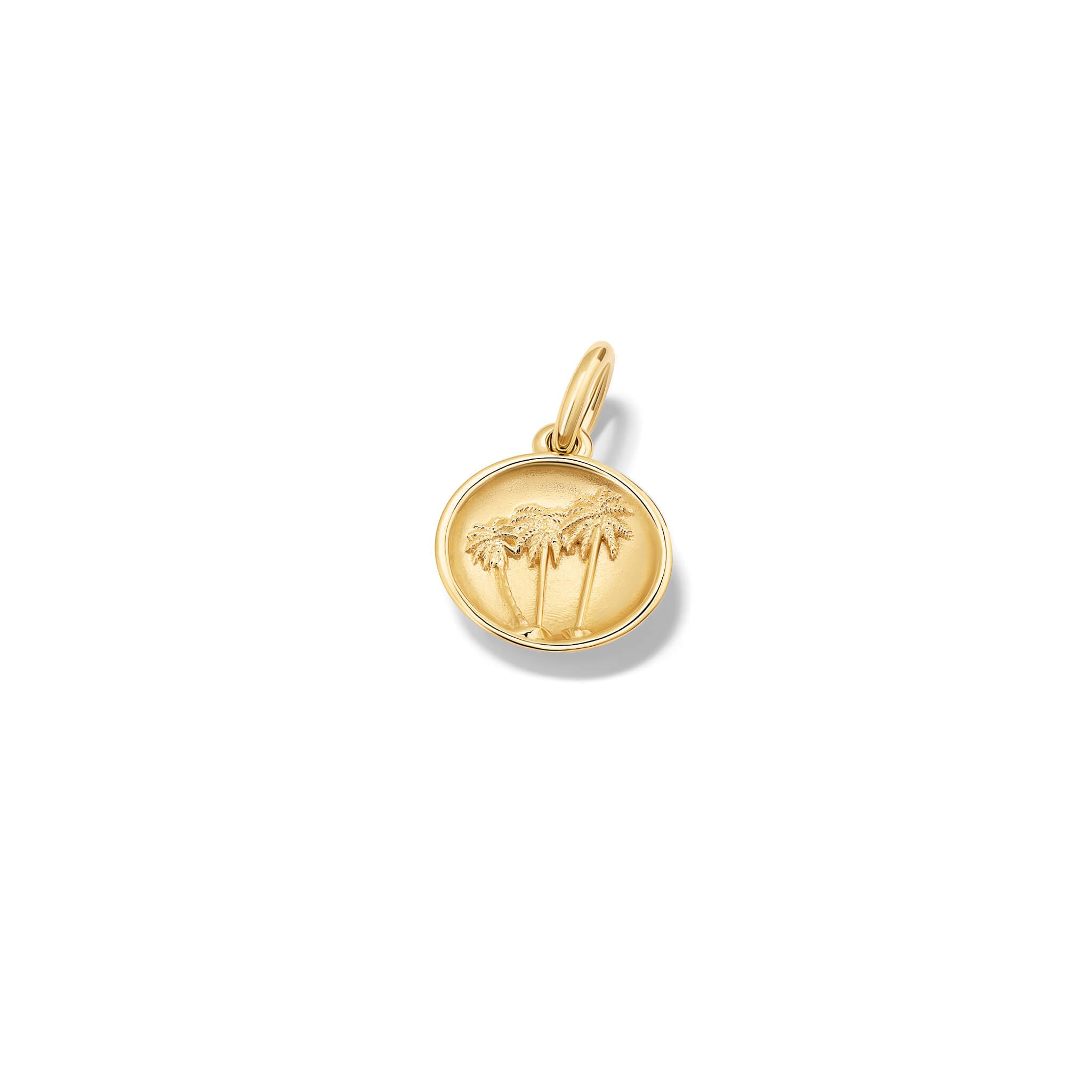 A handcrafted pendant with palm trees'in relief'