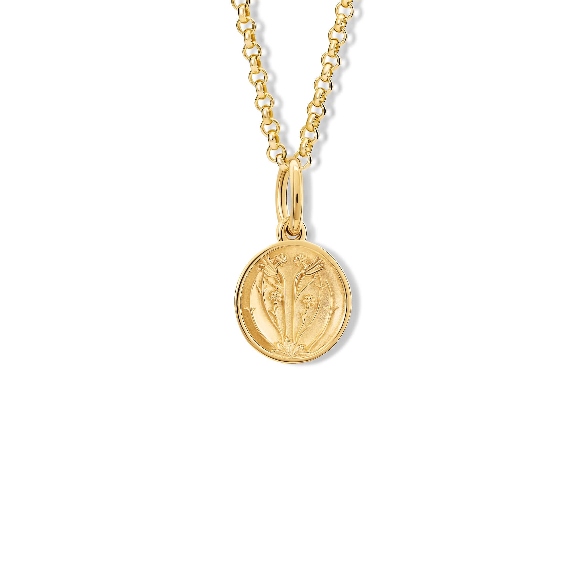 A handcrafted pendant with a tulip 'in relief'
