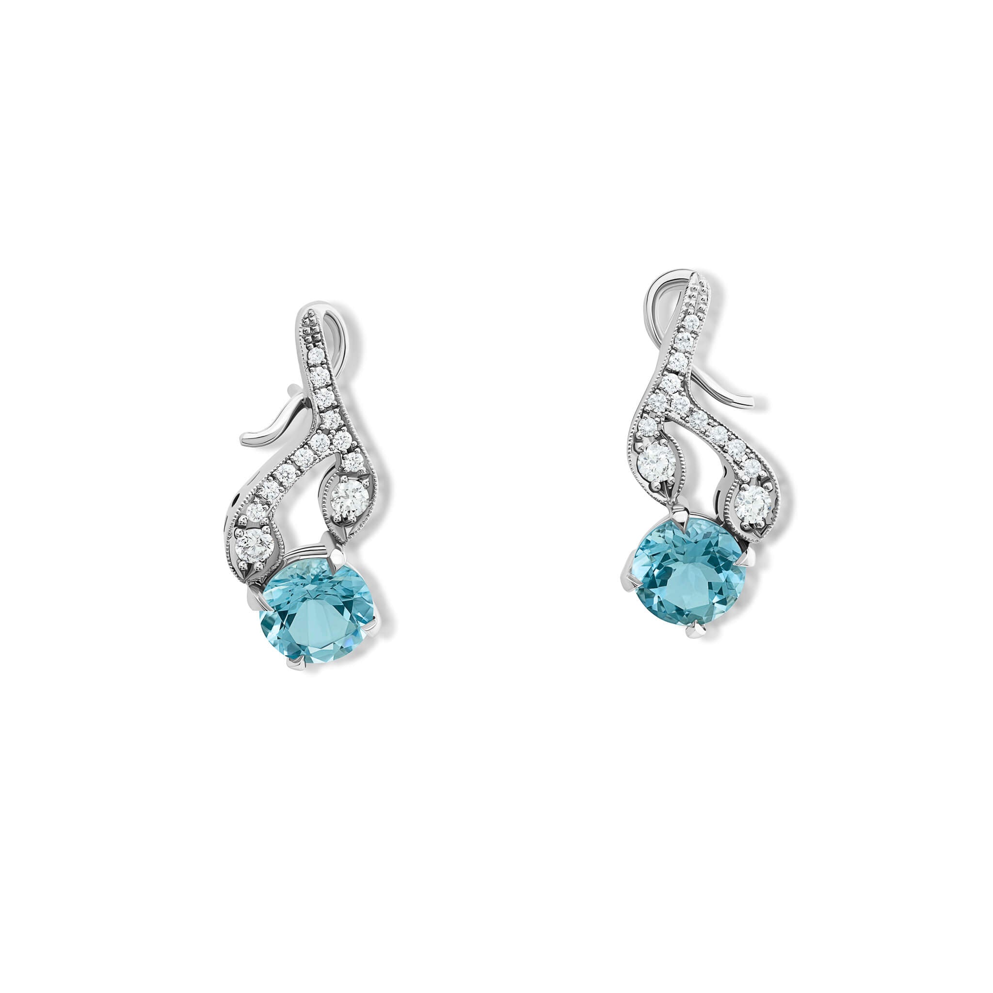 Handcrafted 18ct white gold earrings with diamonds and a aquamarine drop in the shape of a sprig of rosemary.