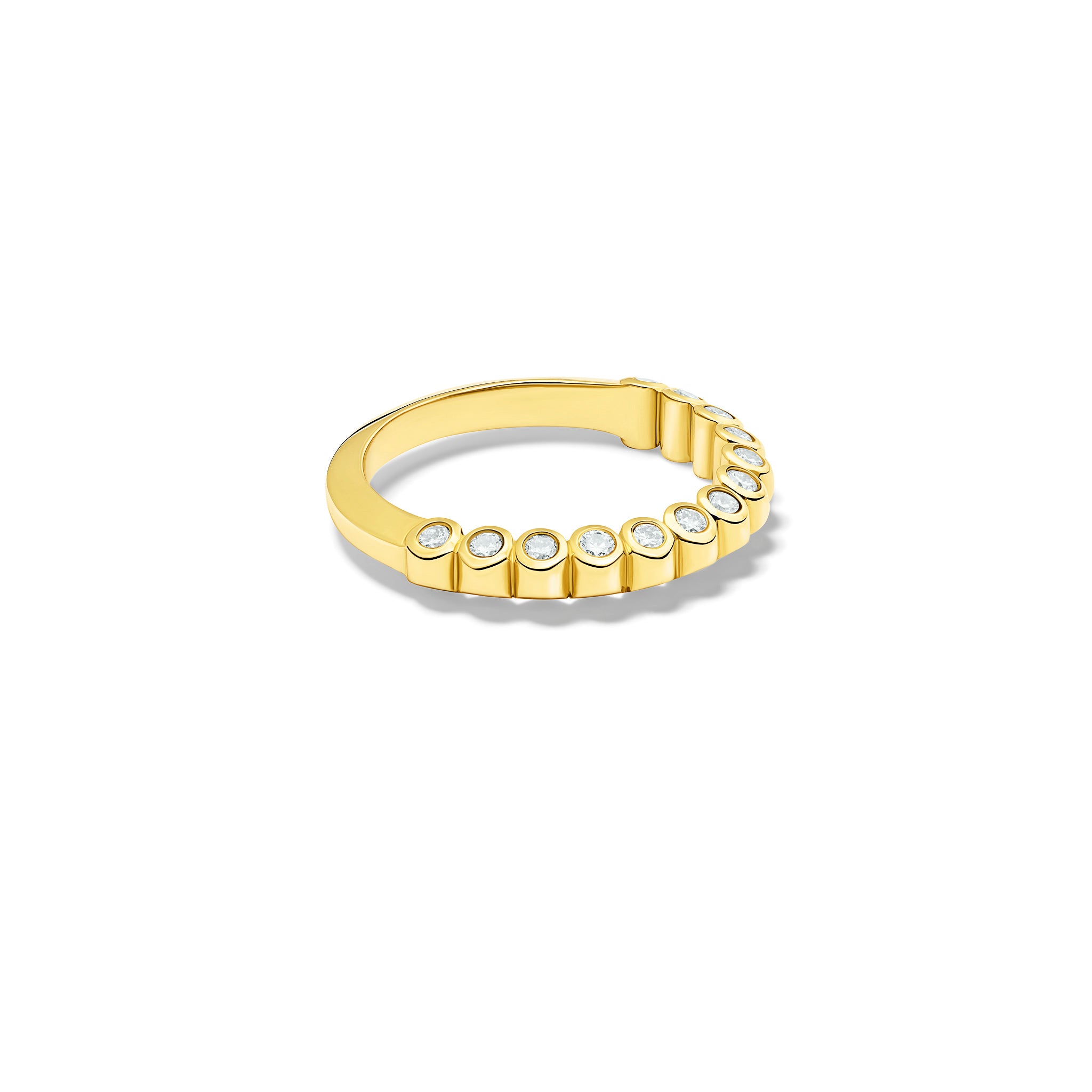 Handcrafted 18ct yellow gold eternity ring with diamonds on the side of the shank and smooth ridges along the top.