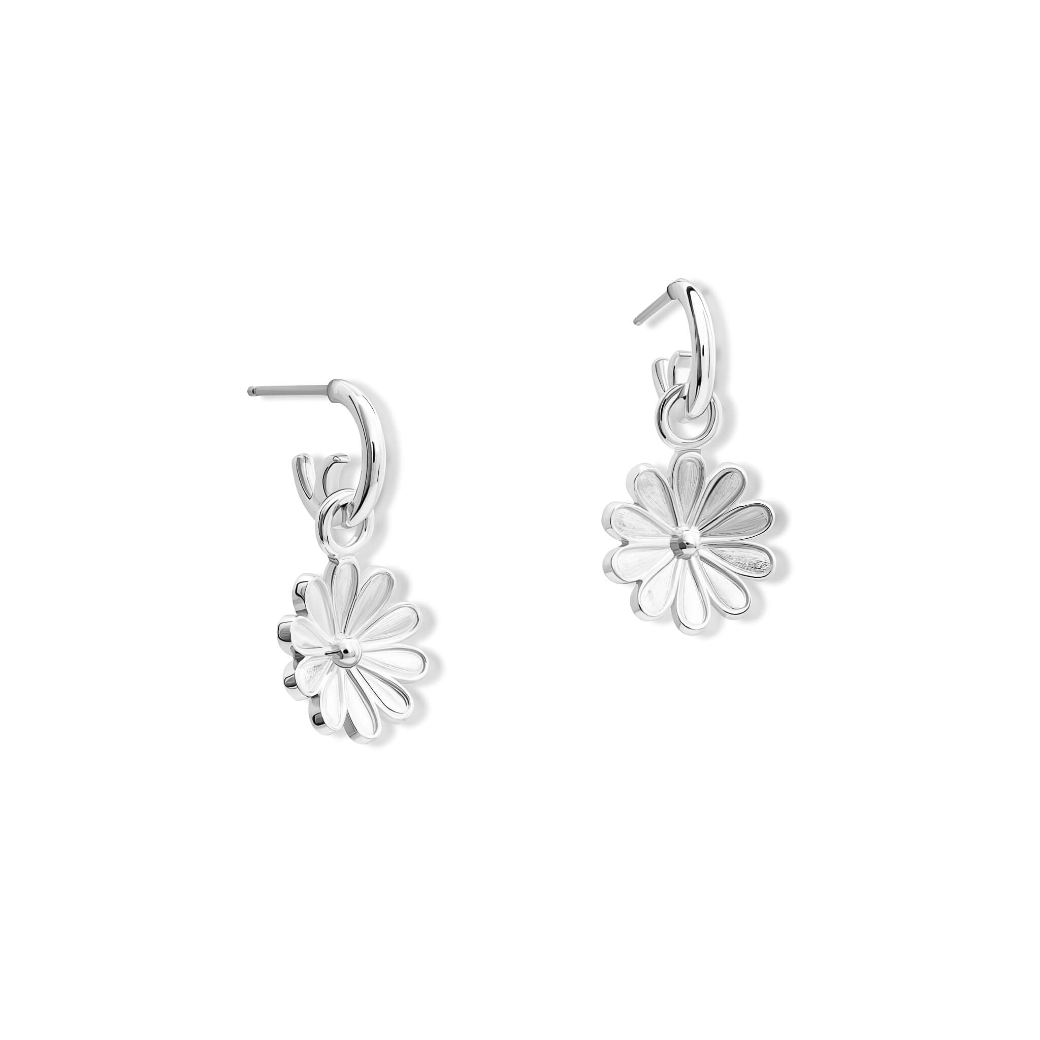 Handcrafted silver earring drops in the shape of an anemone flower on silver hoops 