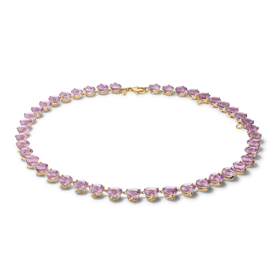 Handcrafted yellow gold necklace featuring circular amethyst gemstones.
