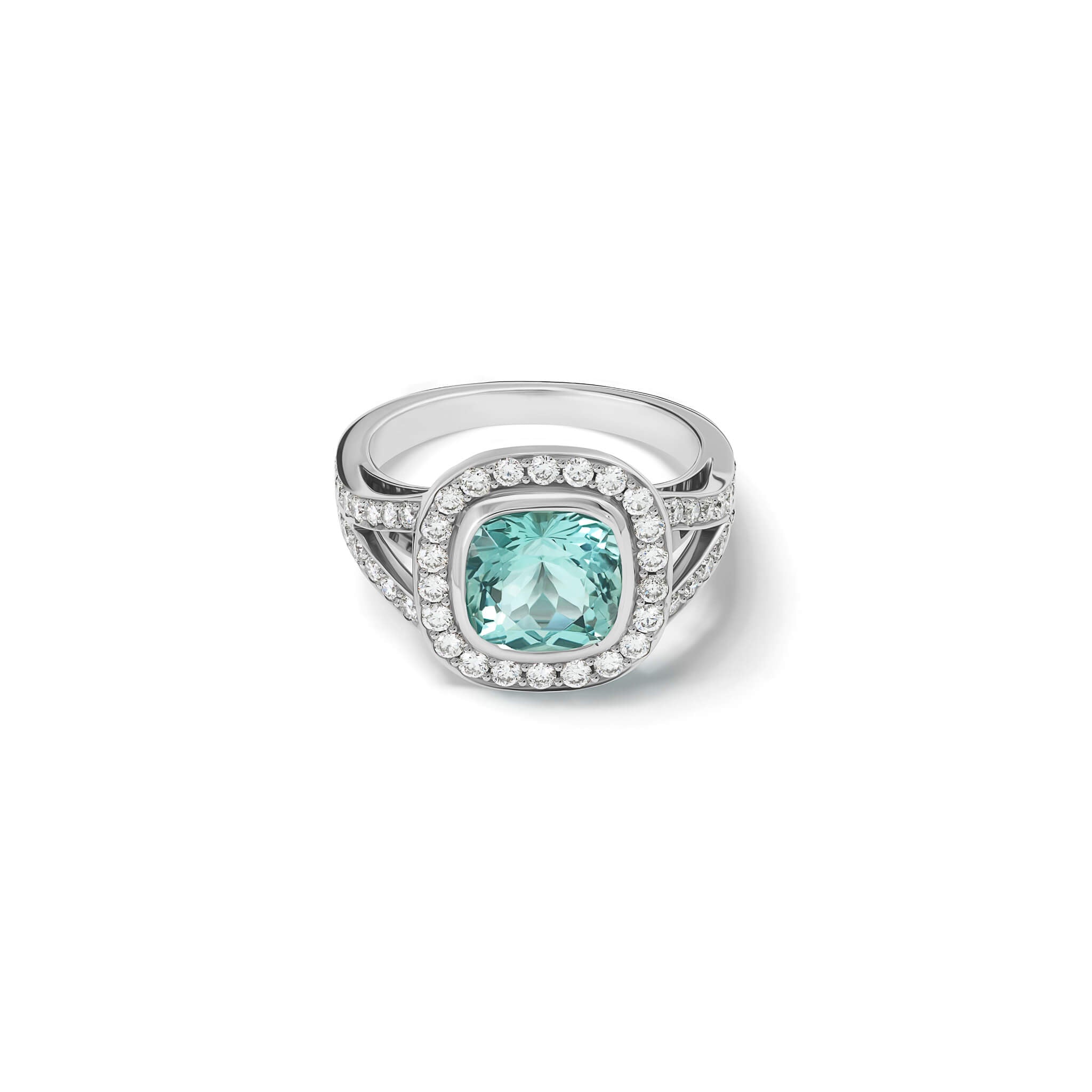 Handcrafted 18ct white gold engagement ring featuring a rub over set cushion-cut aquamarine surrounded by a halo of small diamonds and smaller diamonds embedded along the band.