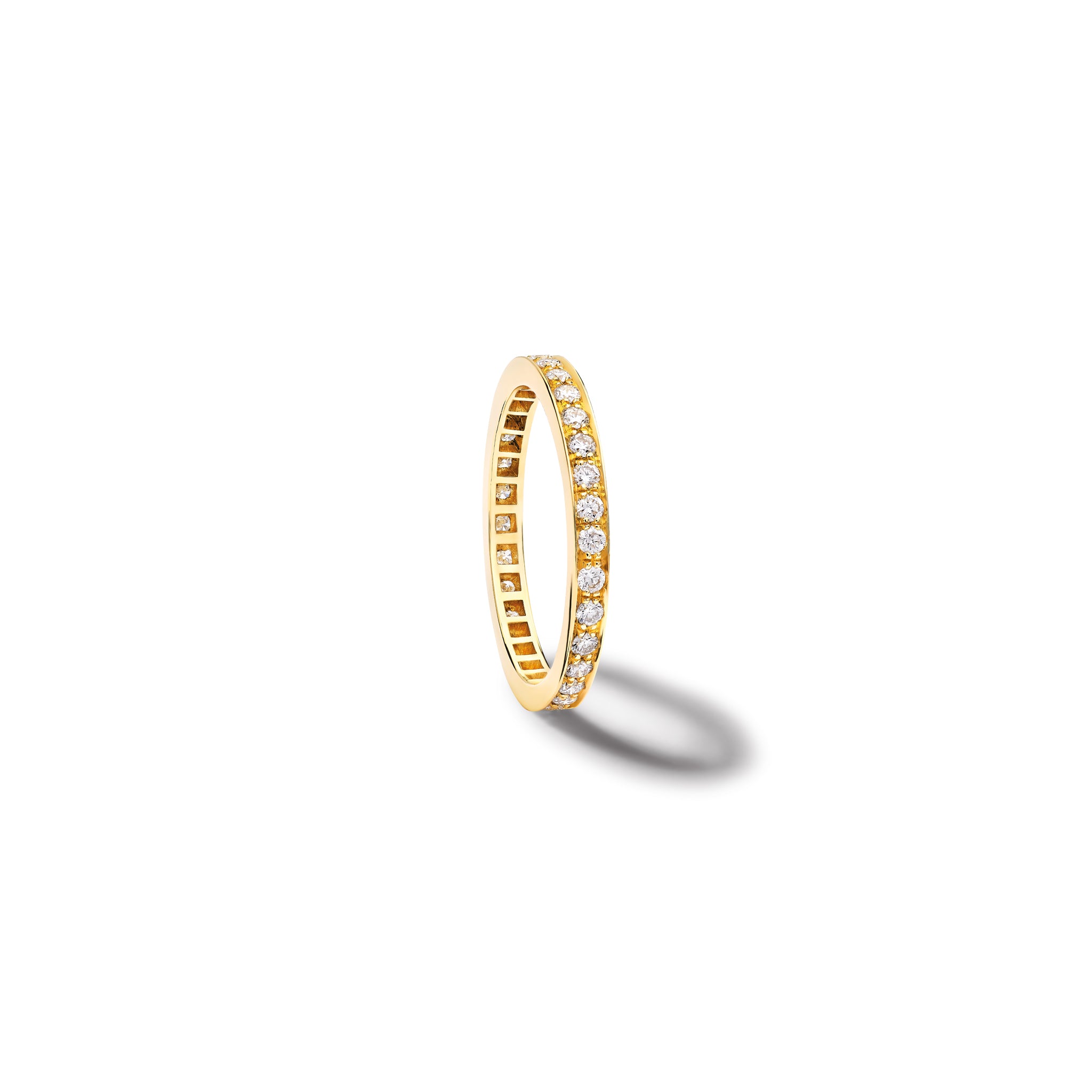 Handcrafted 18ct yellow gold wedding band with diamonds set along the band.