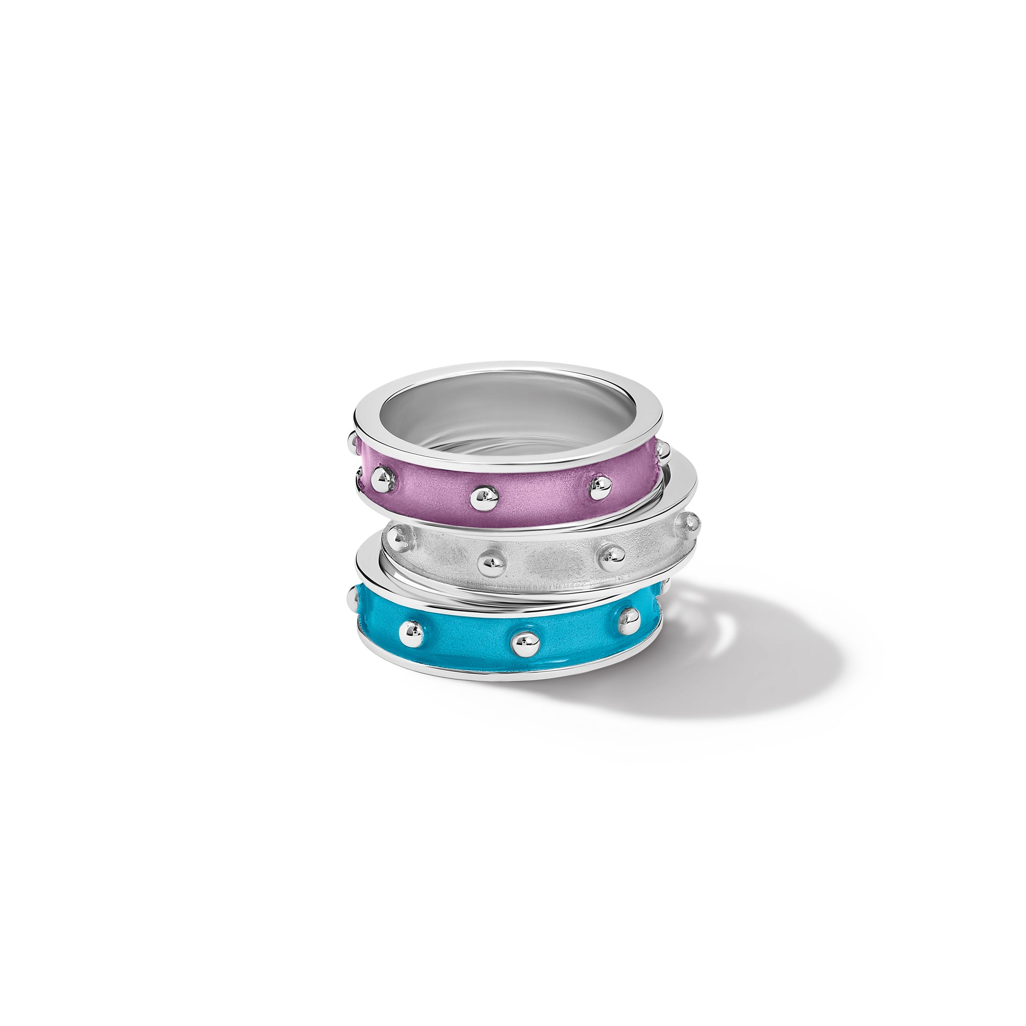 Handcrafted white gold ring with evenly spaced, protruding round dots with diamonds.