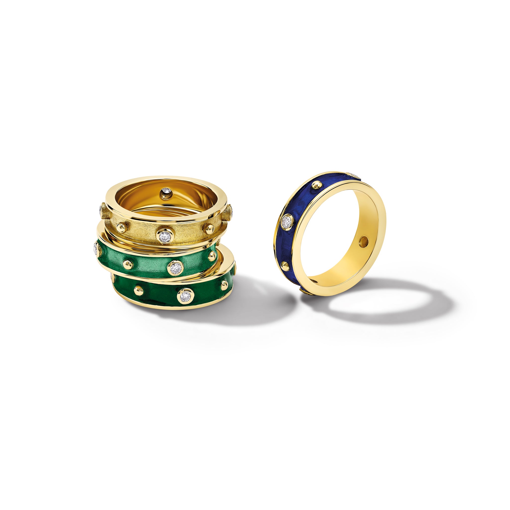 Handcrafted 18ct yellow gold ring with evenly spaced, protruding round dots with emerald green enamel and diamond.