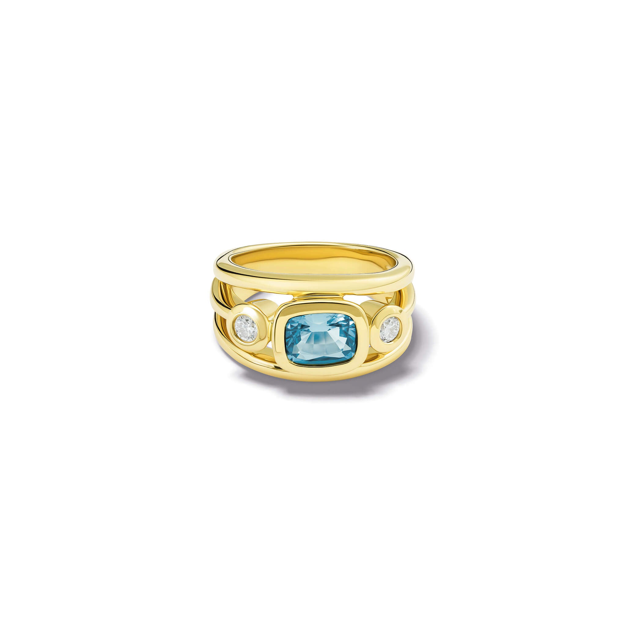 Handcrafted 18ct yellow gold ring with a central cushion cut aquamarine, the birthstone of March, flanked by two round diamonds.