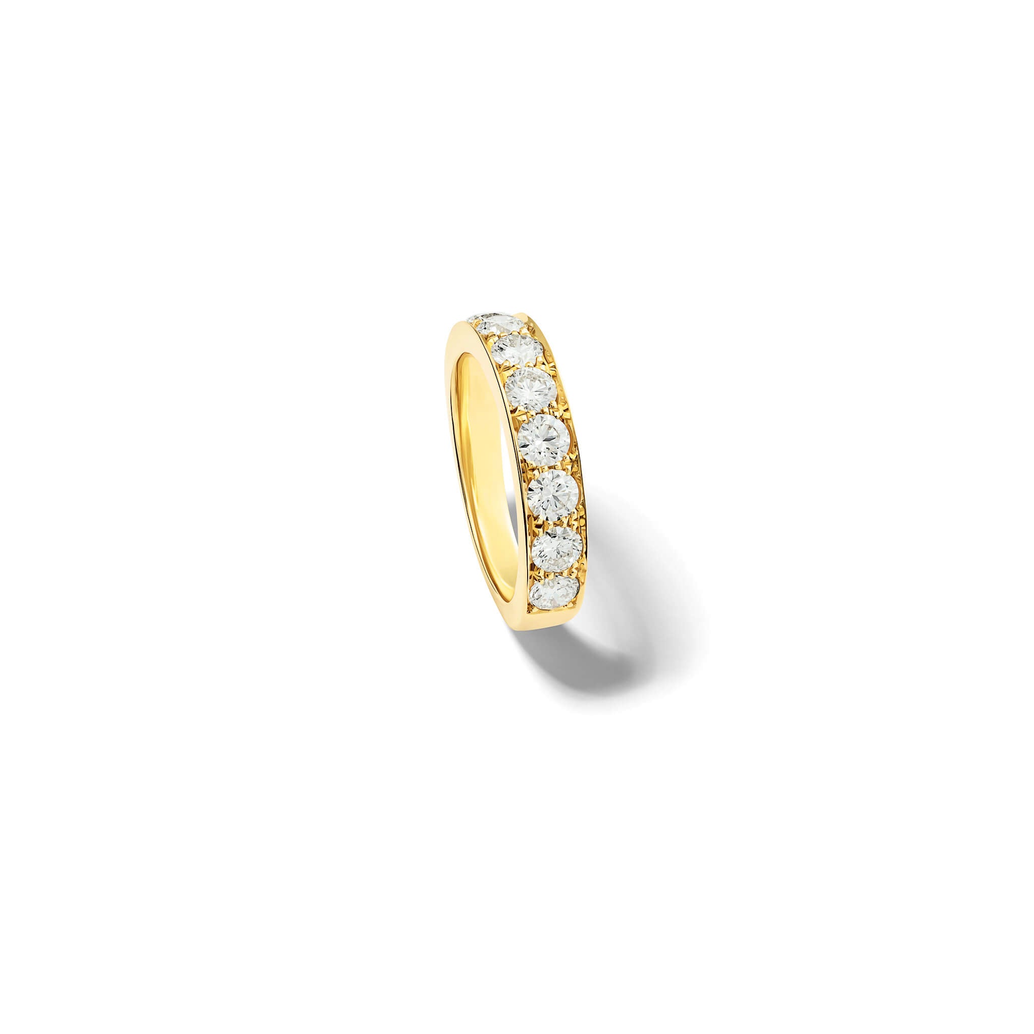 Handcrafted 18ct yellow gold wedding band set with diamond along half of the band.