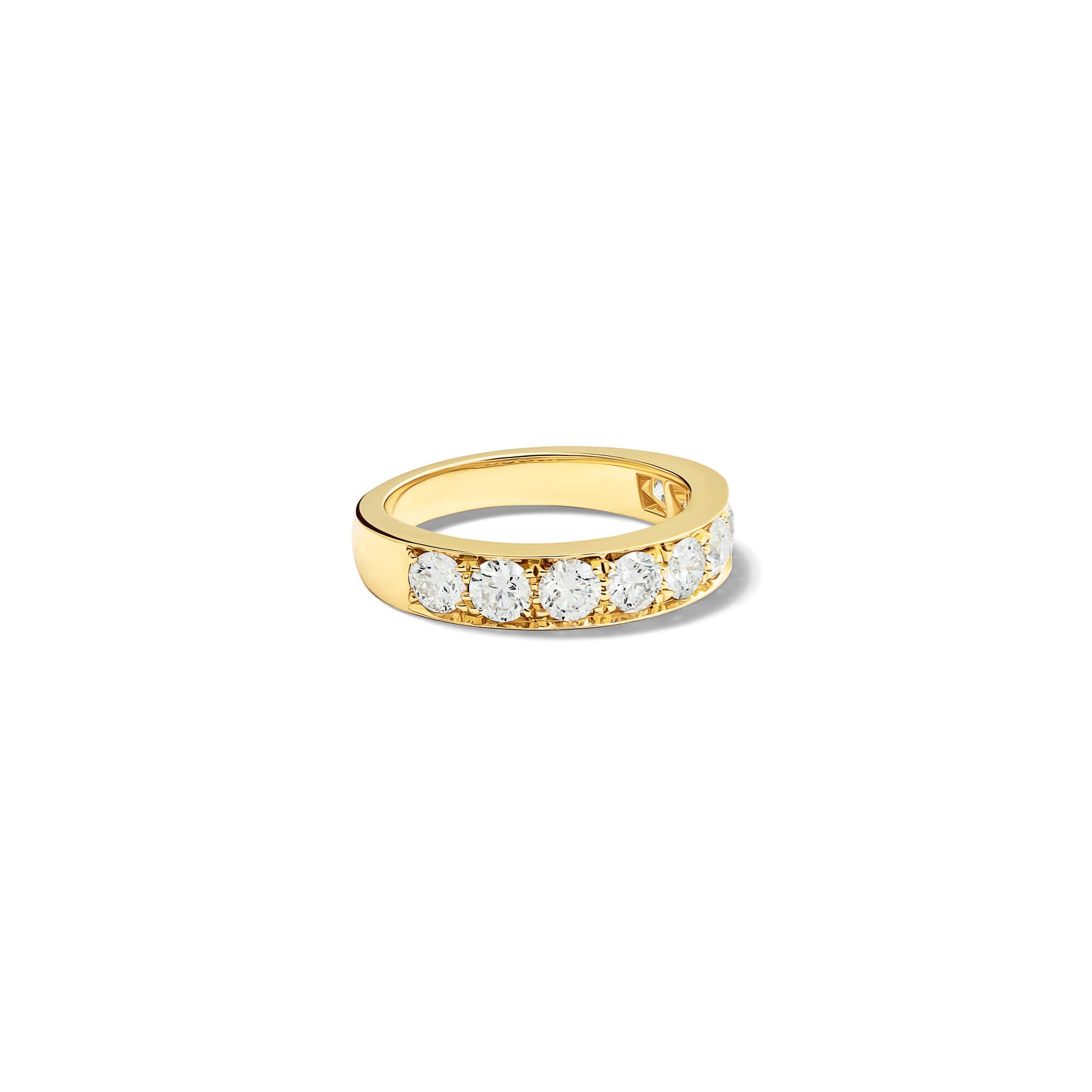 Handcrafted 18ct yellow gold wedding band set with diamond along half of the band.