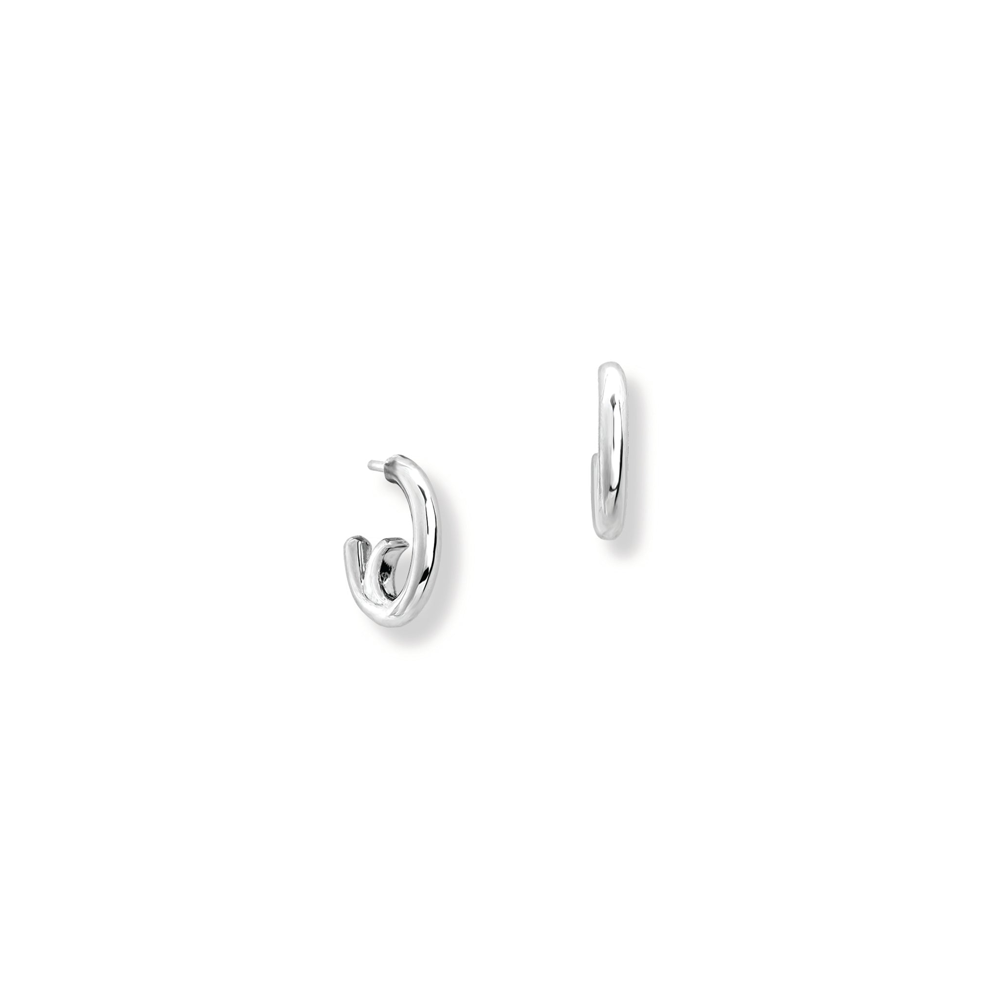 Handcrafted sterling silver and white gold hoop earring set. 
