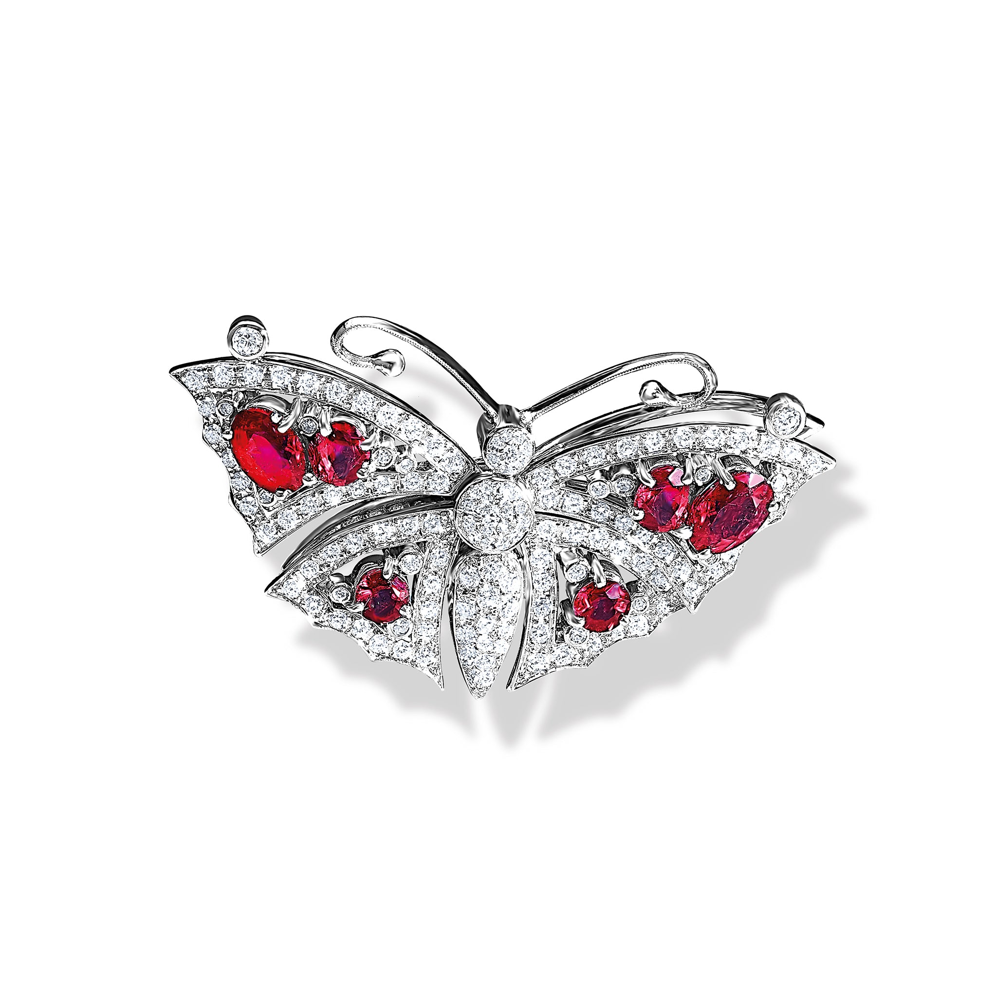 Handcrafted butterfly necklace pendant and brooch in 18ct white gold set with rubies and diamonds.