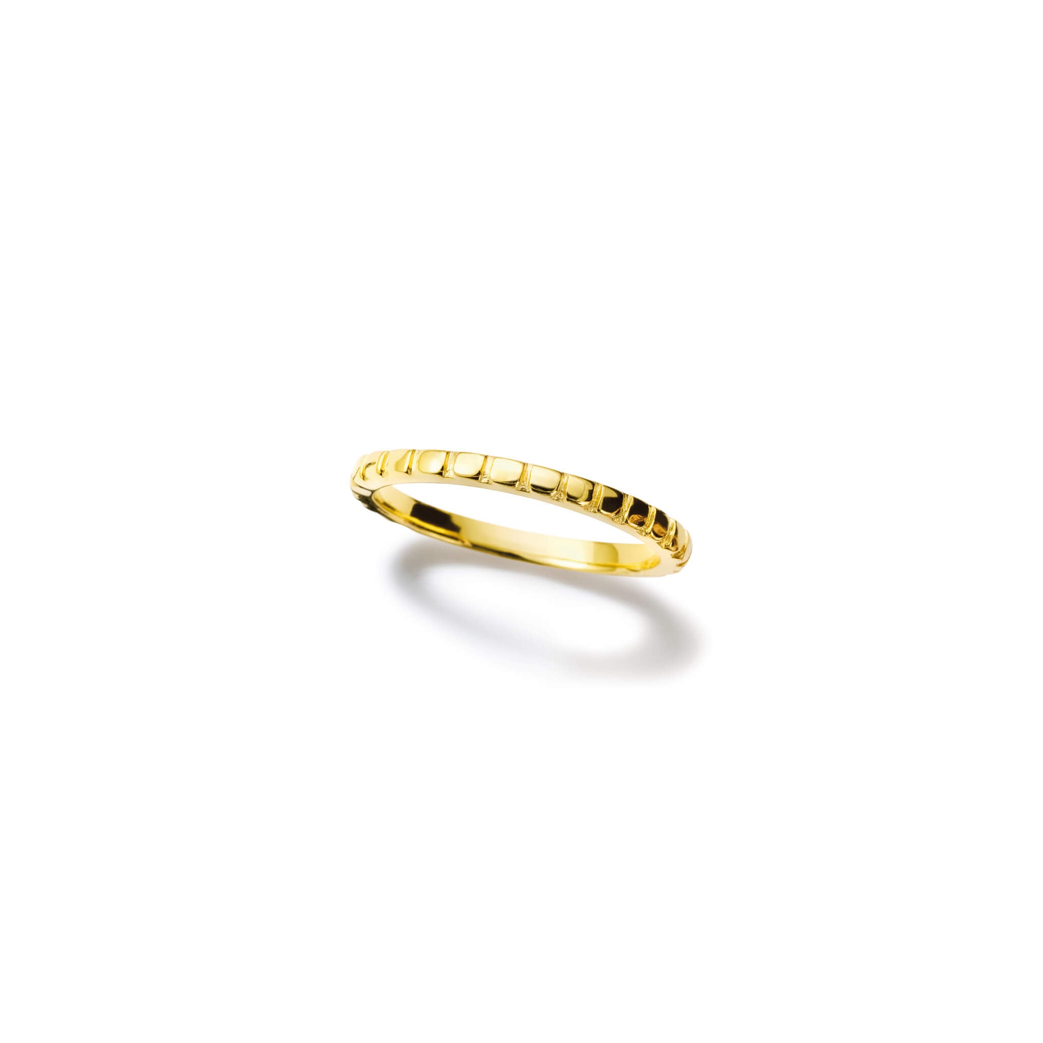 Handcrafted 18ct yellow gold ring with evenly engraved straight lines, symbolising the chrysanthemum flowers.