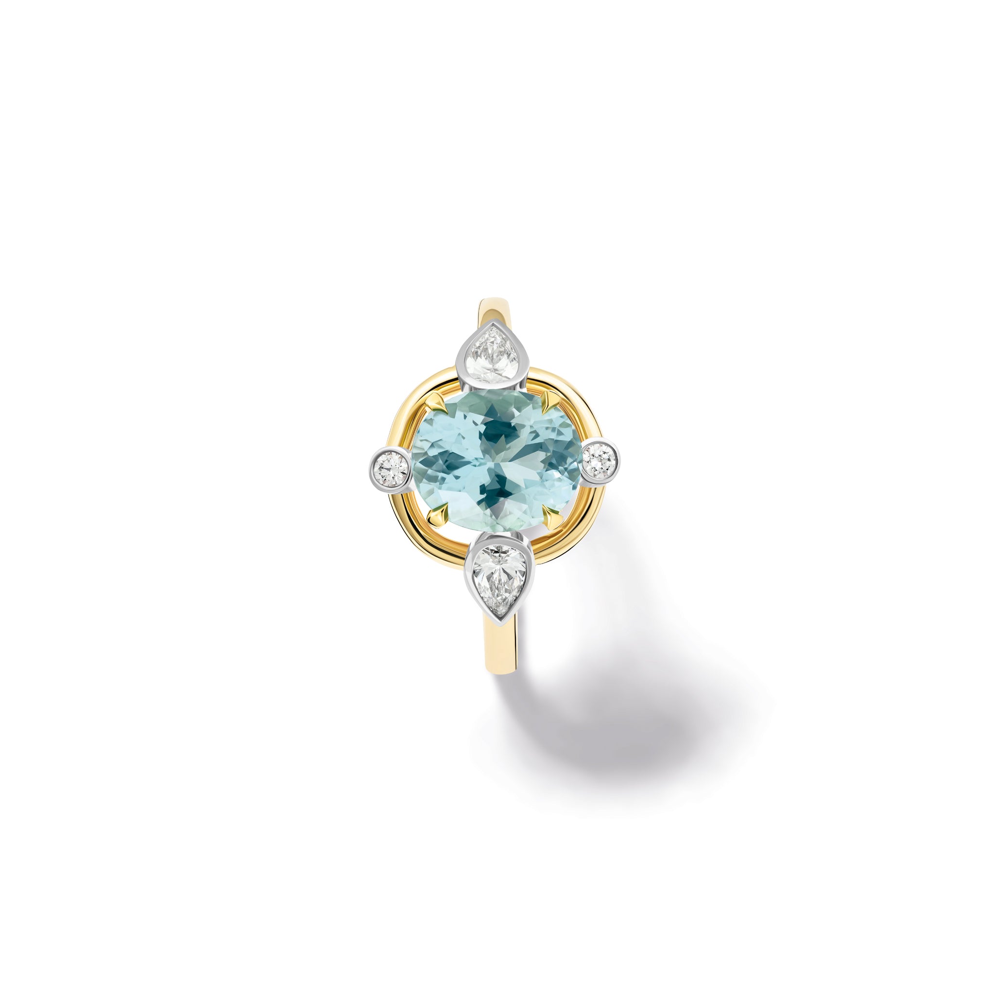 Handcrafted 18ct yellow gold engagement ring featuring a soft blue aquamarine at its centre, surrounded by four smaller diamonds, two teardrop-shaped, march birthstone.