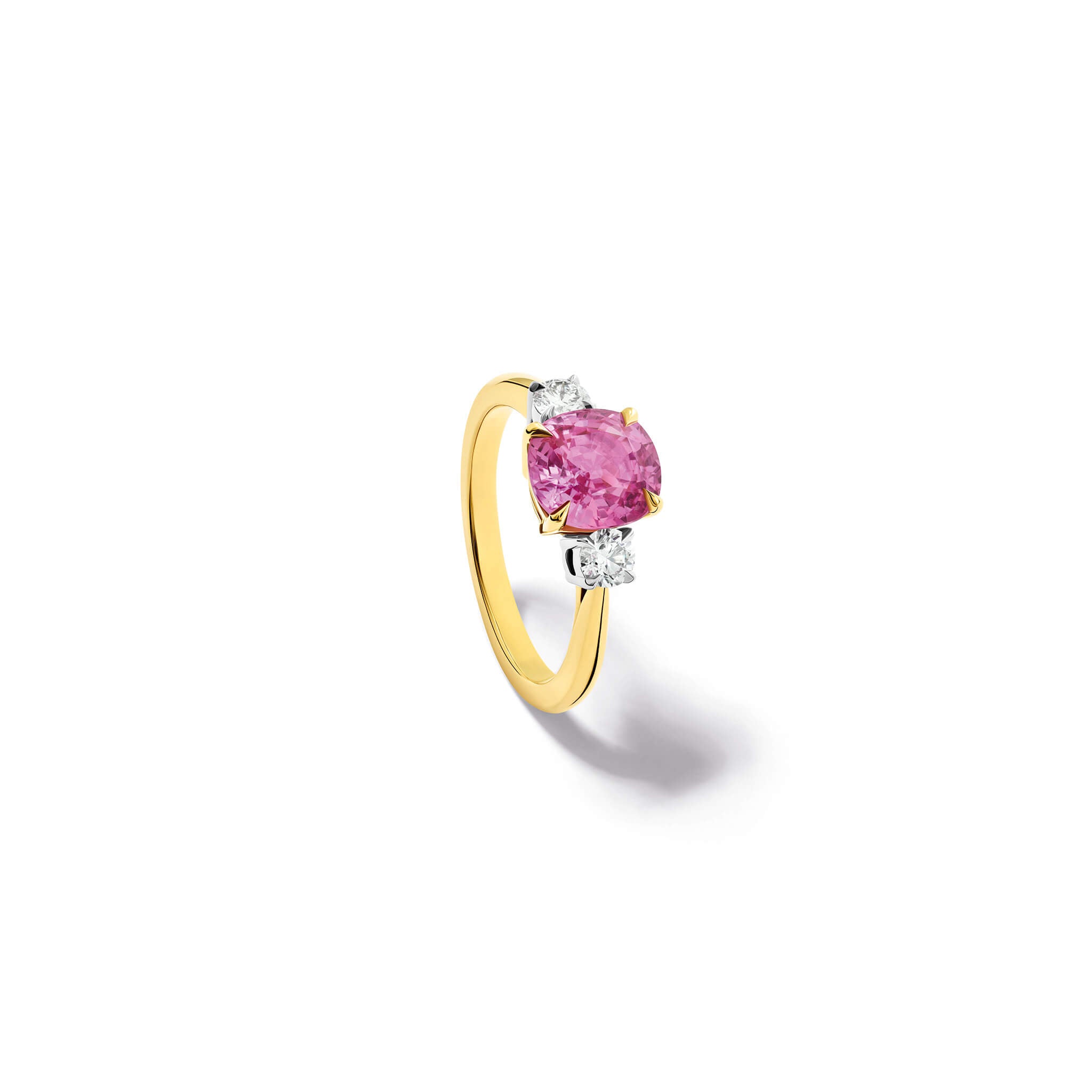 Handcrafted Delilah engagement ring in 18ct yellow and white gold with pink sapphire and diamond.