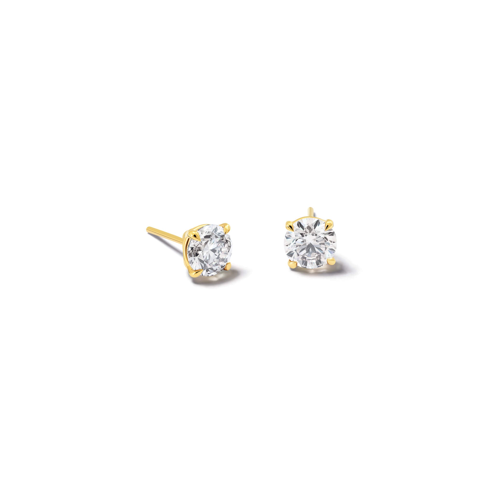 Handcrafted 18ct yellow gold interchangeable stud earrings featuring round diamond, the birthstone of april