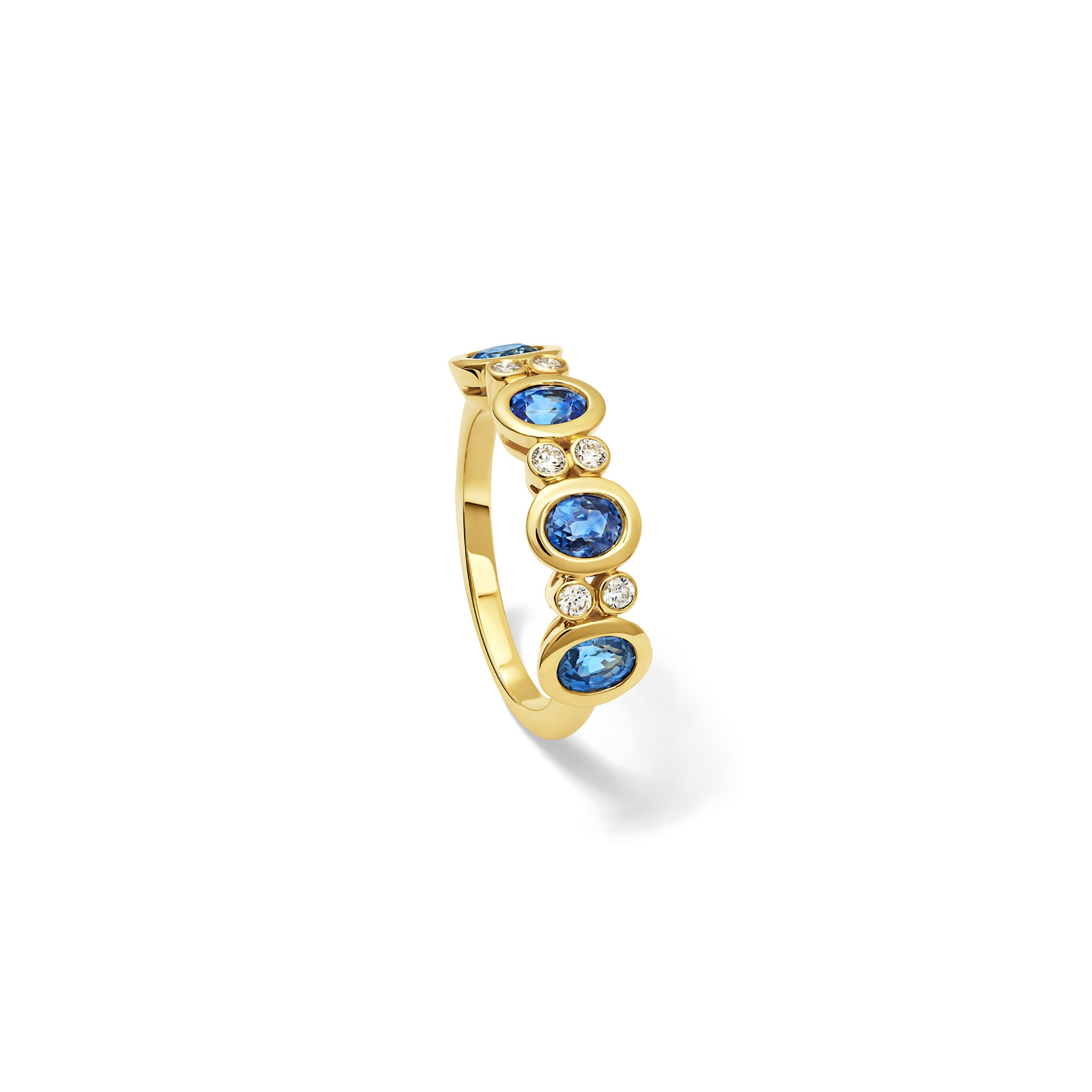 Handcrafted Imara half-eternity ring in 18ct yellow gold with oval cut blue sapphire and diamond, September birthstone
