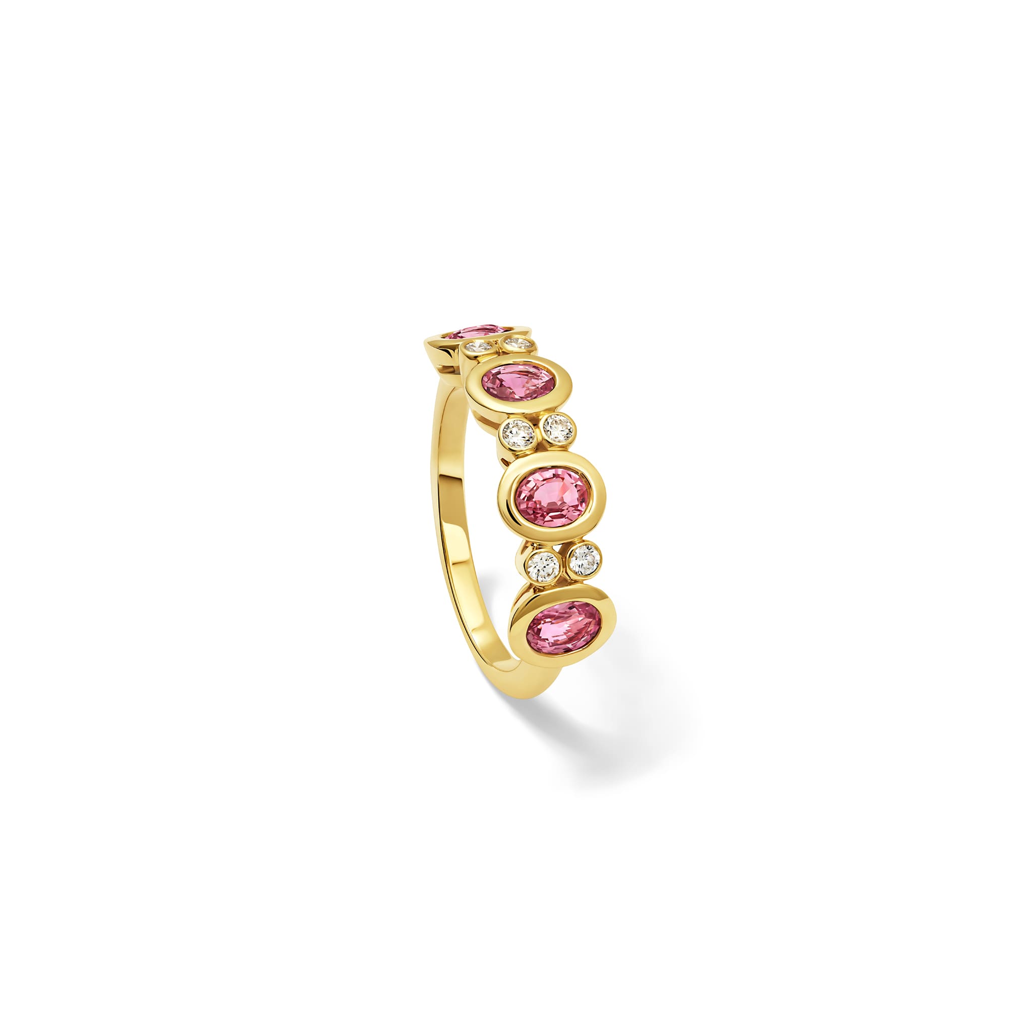 Handcrafted Imara half-eternity ring in 18ct yellow gold with oval cut pink sapphire and diamond, September birthstone