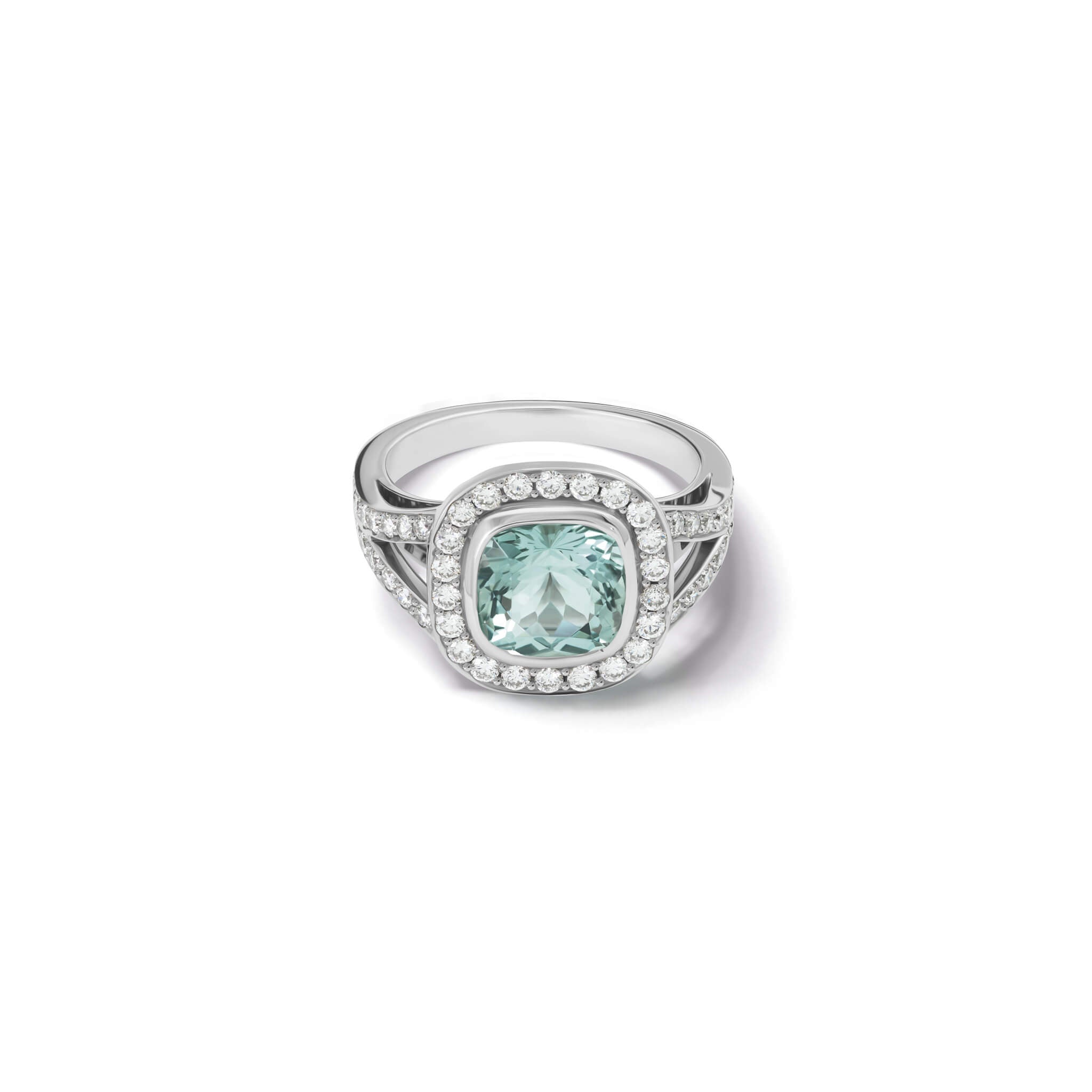 Handcrafted 18ct white gold engagement ring featuring a rub over set cushion-cut aquamarine surrounded by a halo of small diamonds and smaller diamonds embedded along the band.