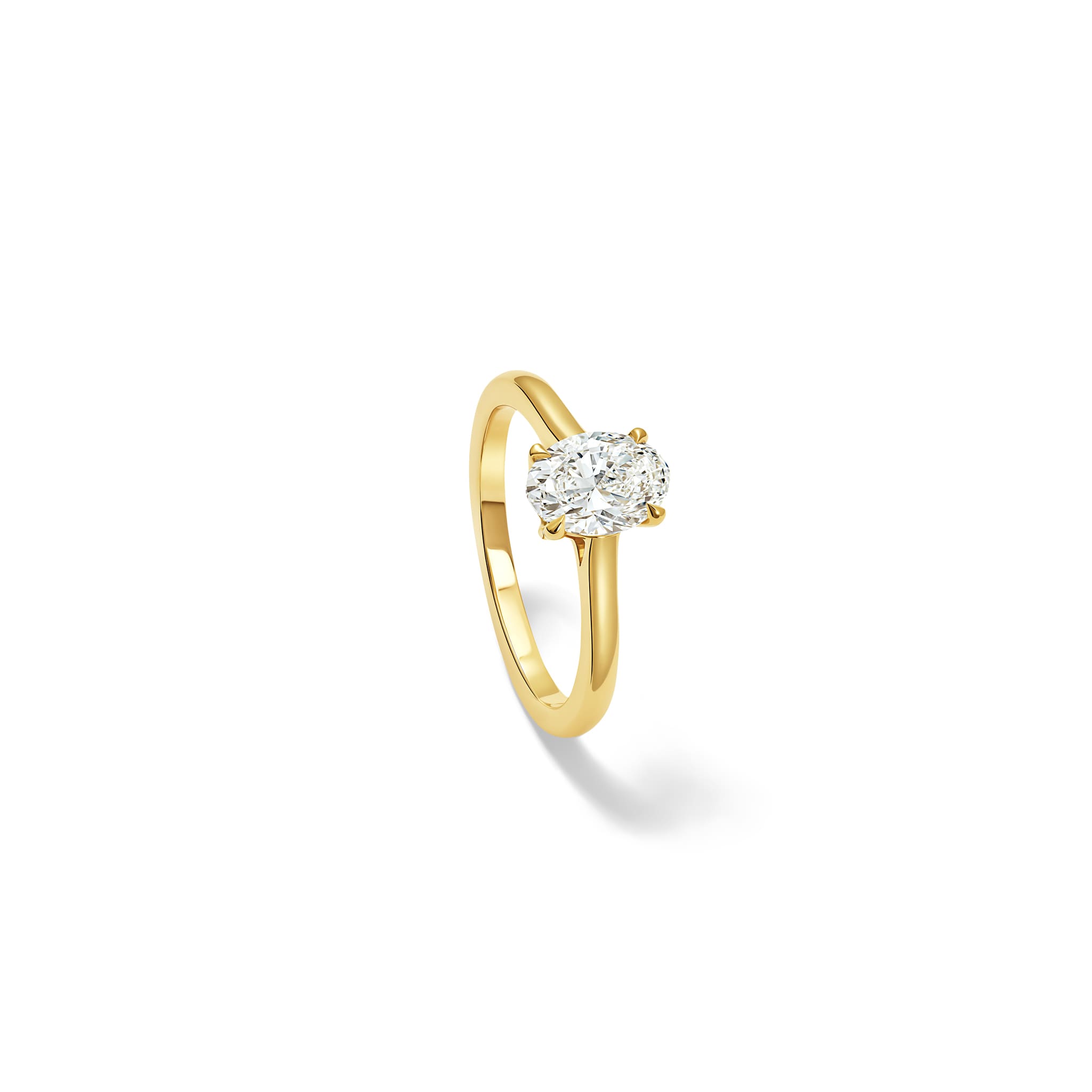 Handcrafted Lilia engagement ring in yellow gold with oval diamond 