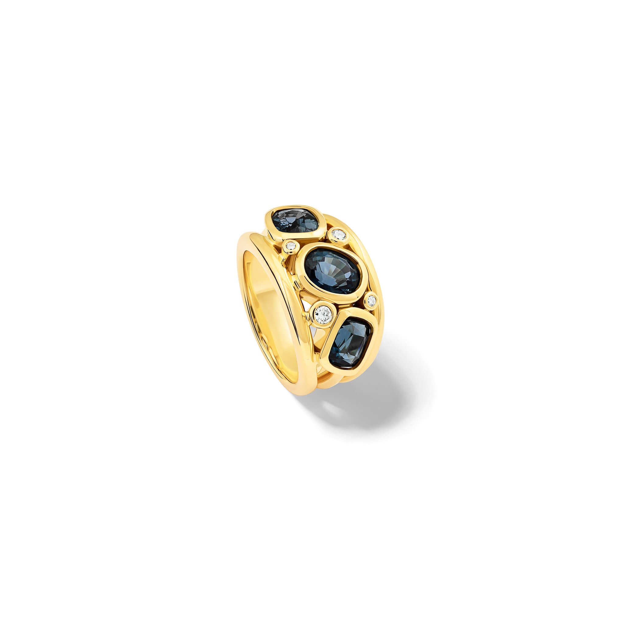 Handcrafted 18ct yellow gold ring featuring three blue spinels and smaller diamonds.